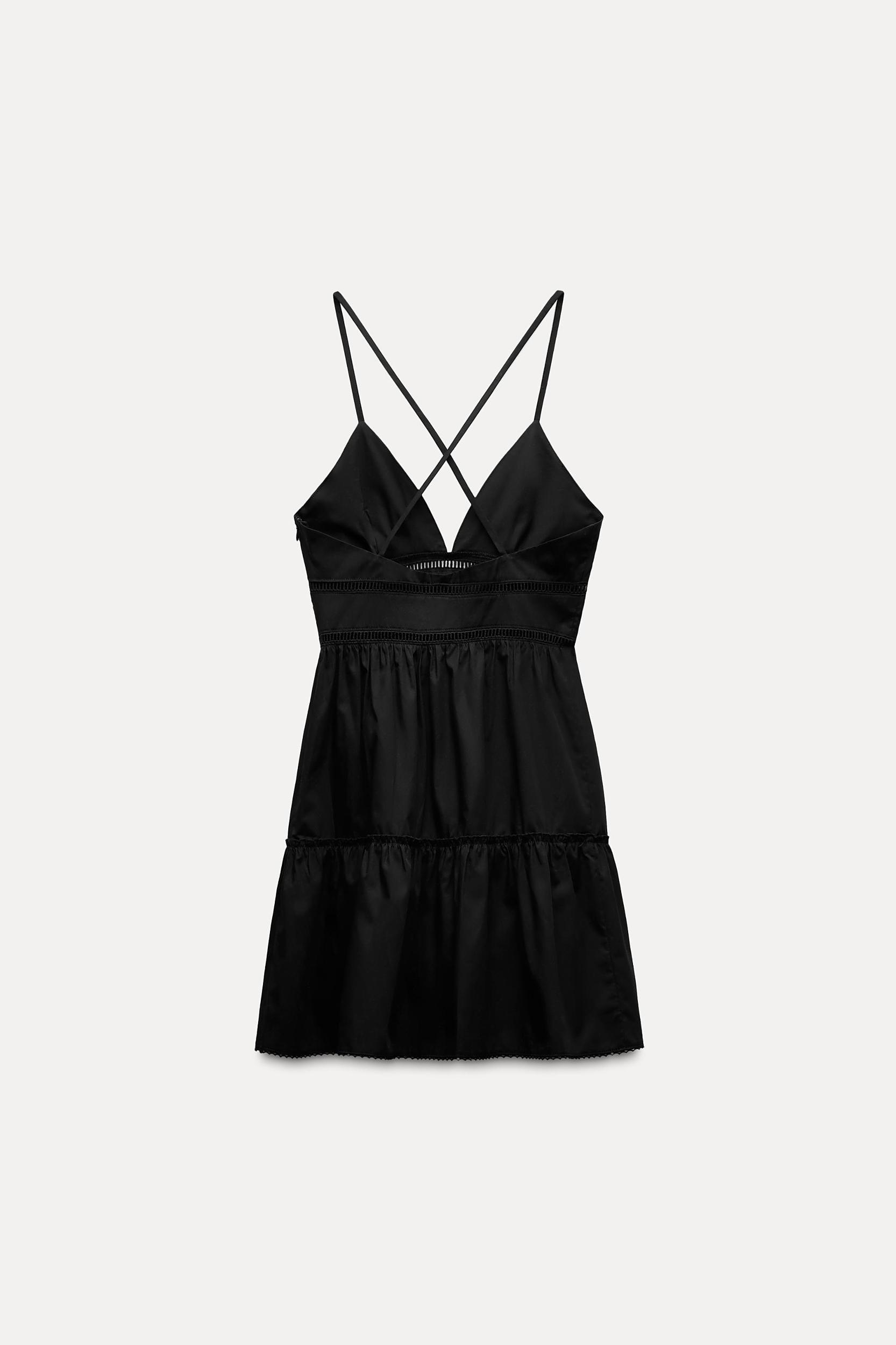V-neck dress with thin straps that cross at back. Tonal lace insert detail. Side hidden in-seam zip closure. Product Image