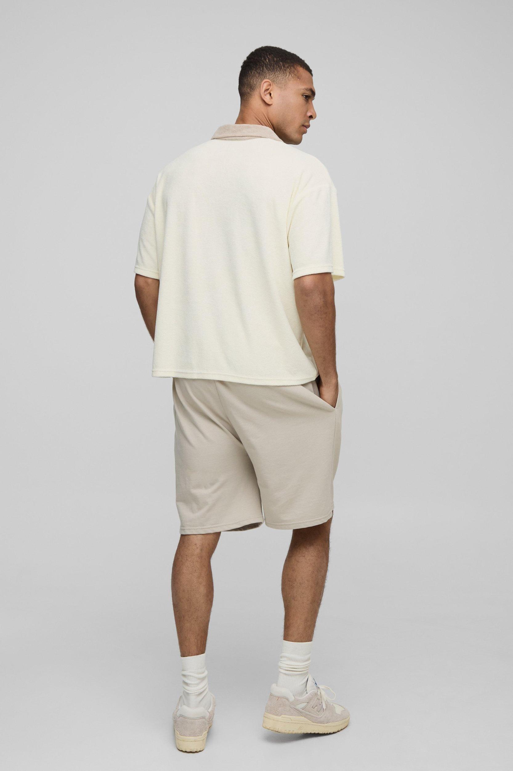 Boxy Contrast Collar Towelling V Neck Polo | boohooMAN USA Product Image