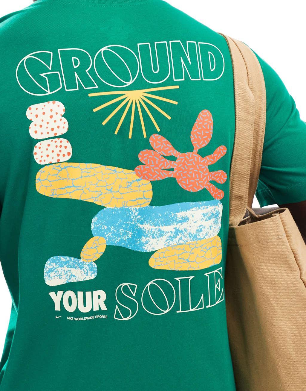 Nike Ground Your Sole graphic T-shirt in green Product Image
