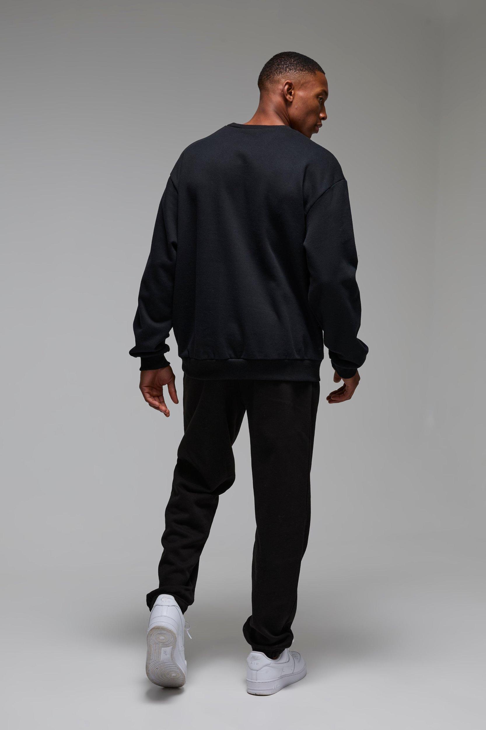 Man Active Los Angeles Lift Club Oversized Sweatpants | boohooMAN USA Product Image