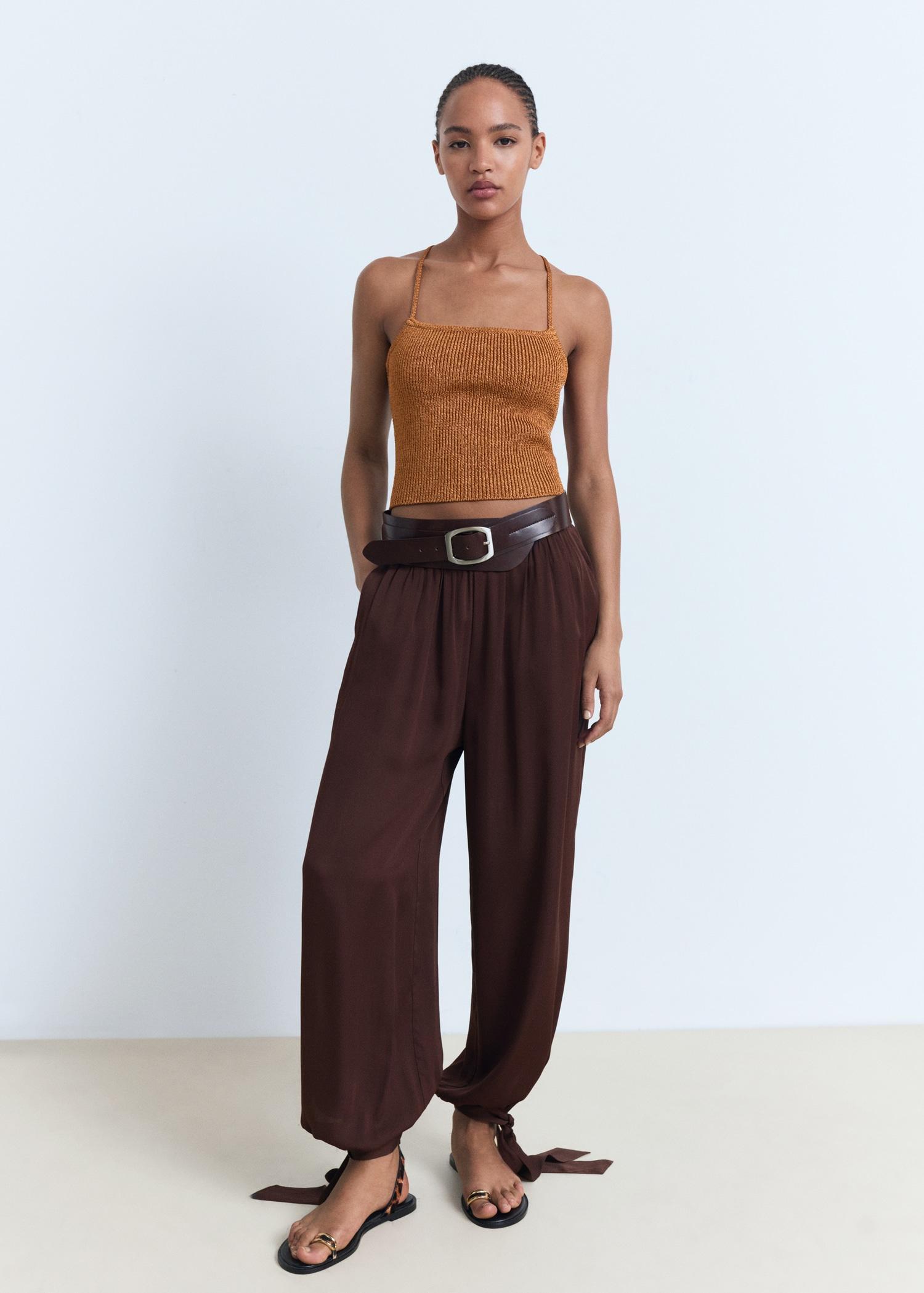 Lurex knitted top with crossed back - Women | MANGO USA Product Image