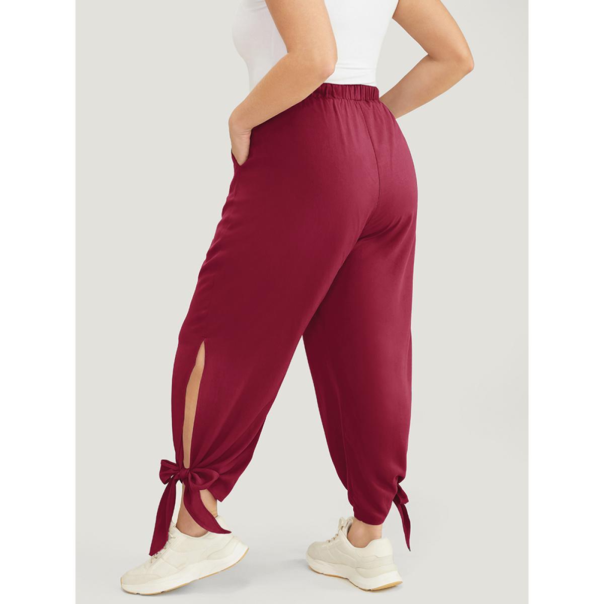 Plus Size Solid Knotted Split Hem Pocket Pants Women Scarlet Casual Loose High Rise Dailywear Pants BloomChic 14-16/1X Product Image