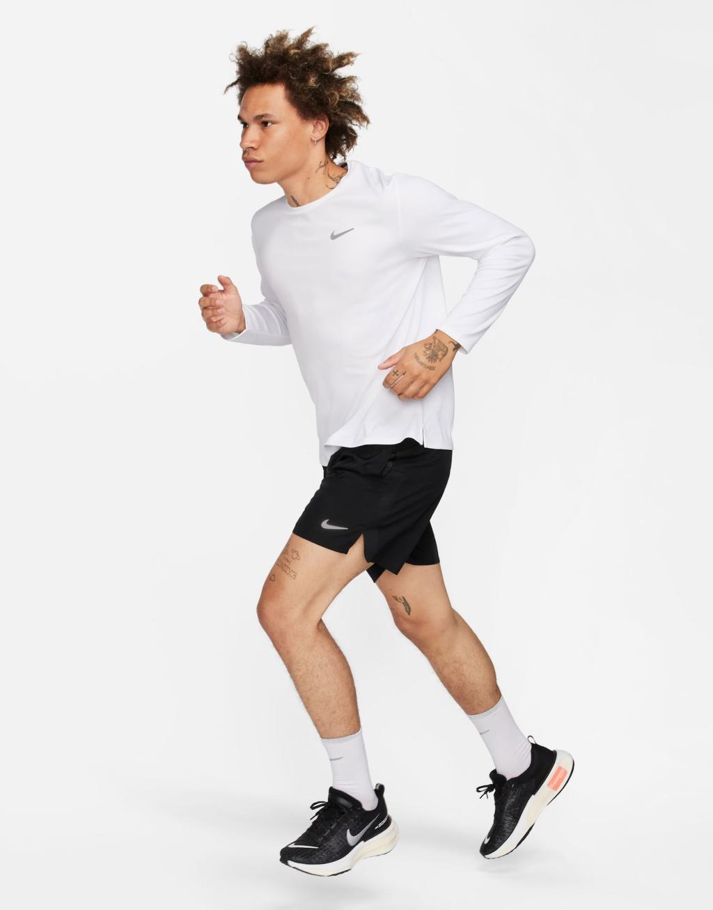 Nike Running Dri-FIT Miler long sleeve top in white  Product Image