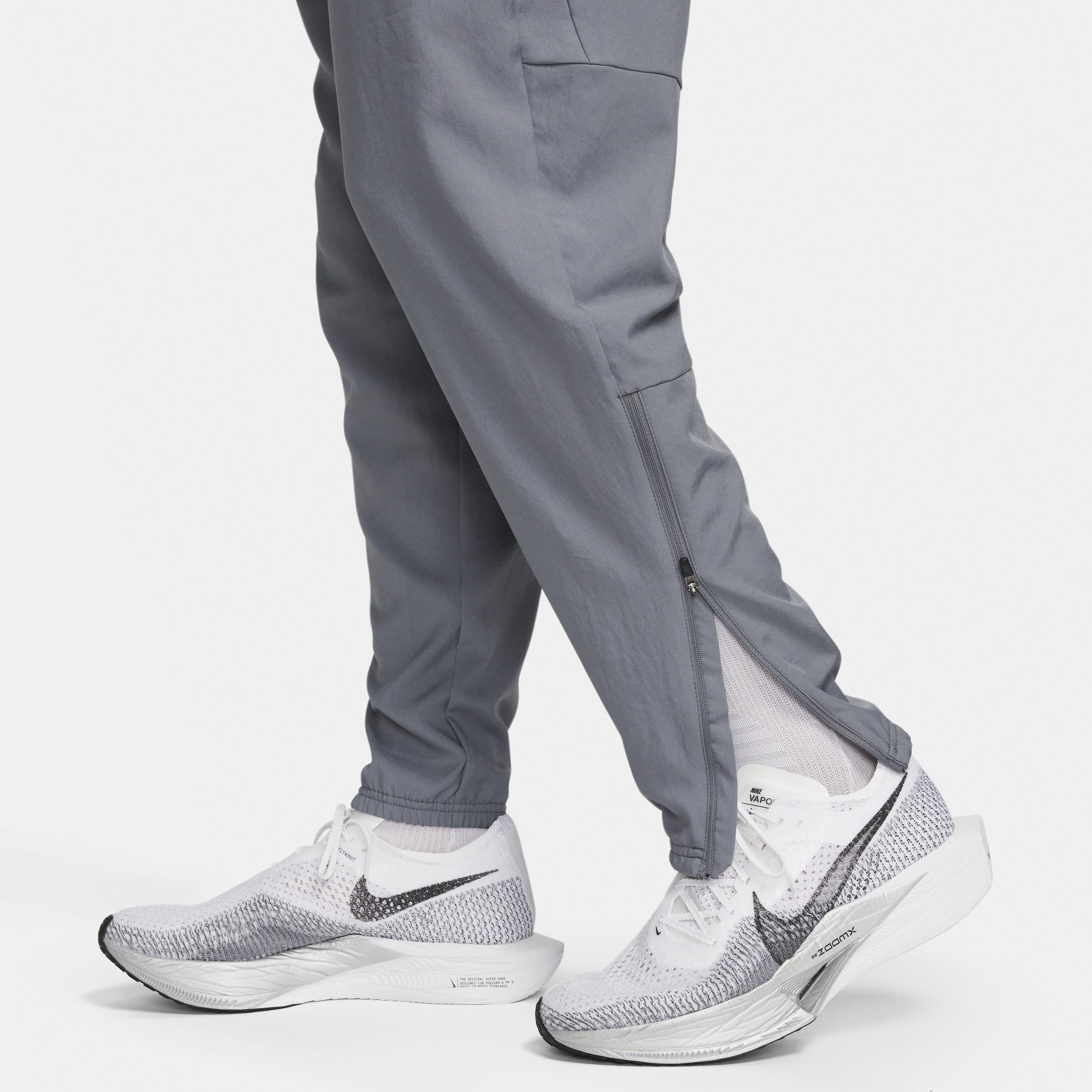 Nike Men's Challenger Dri-FIT Woven Running Pants in Grey/Smoke Grey Size Medium Polyester Product Image