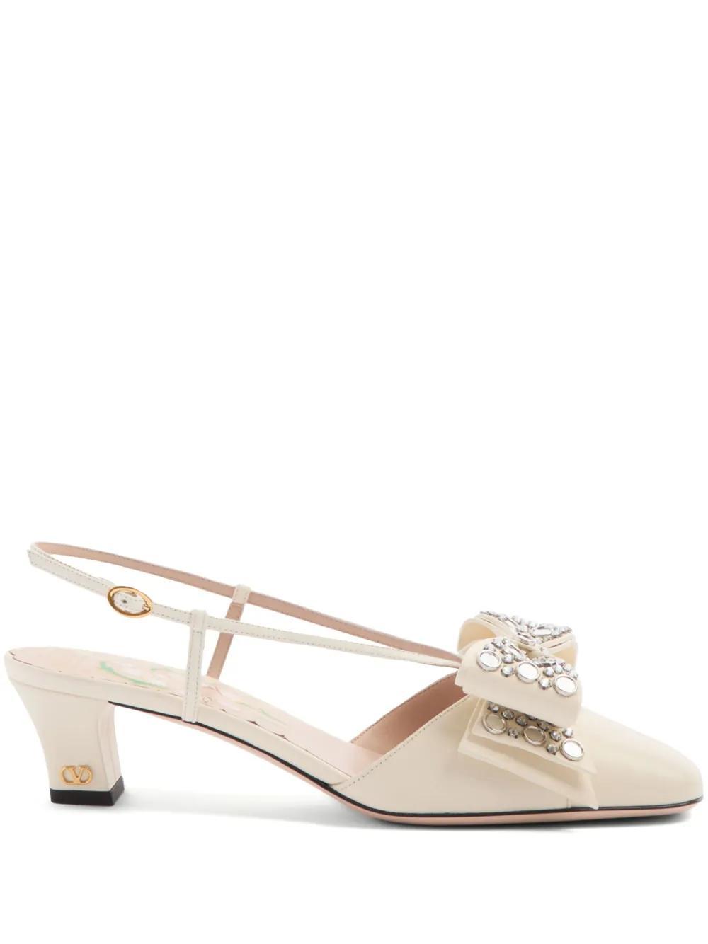 VALENTINO GARAVANI Bowow Studded Bow Slingback Pumps In White Product Image