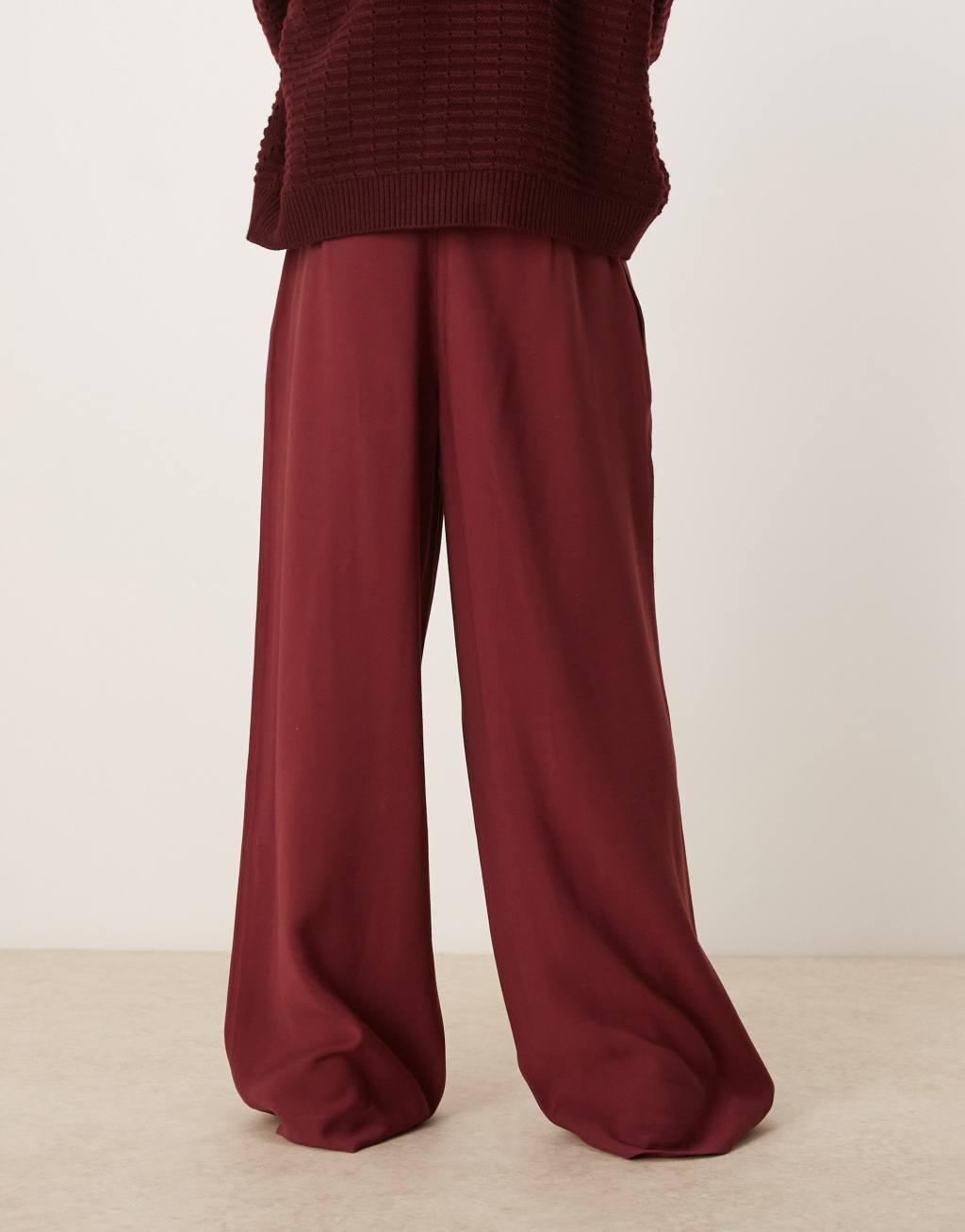 ASOS DESIGN loose fit smart pants in burgundy Product Image