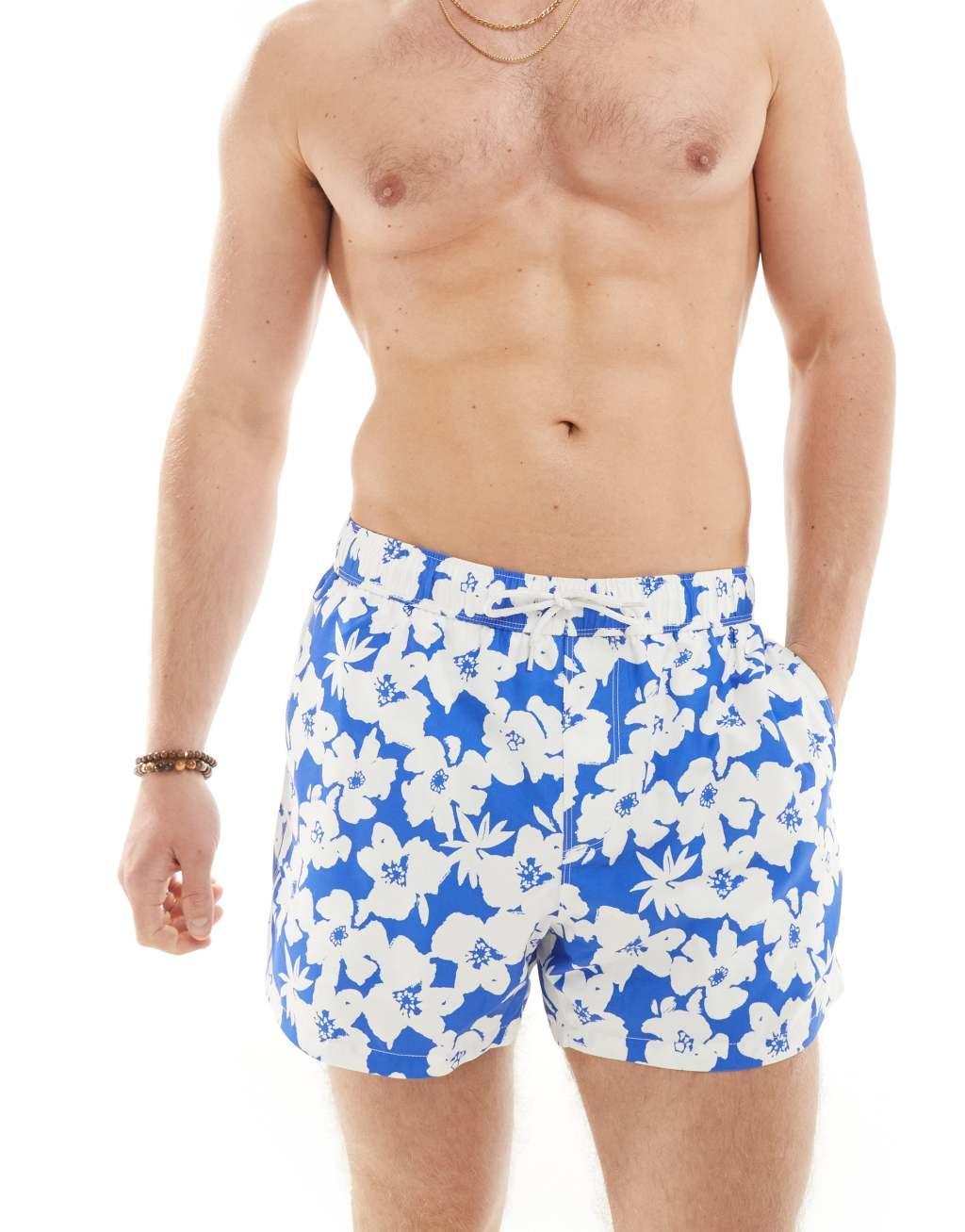 ASOS DESIGN swim shorts in short length in blue floral print Product Image