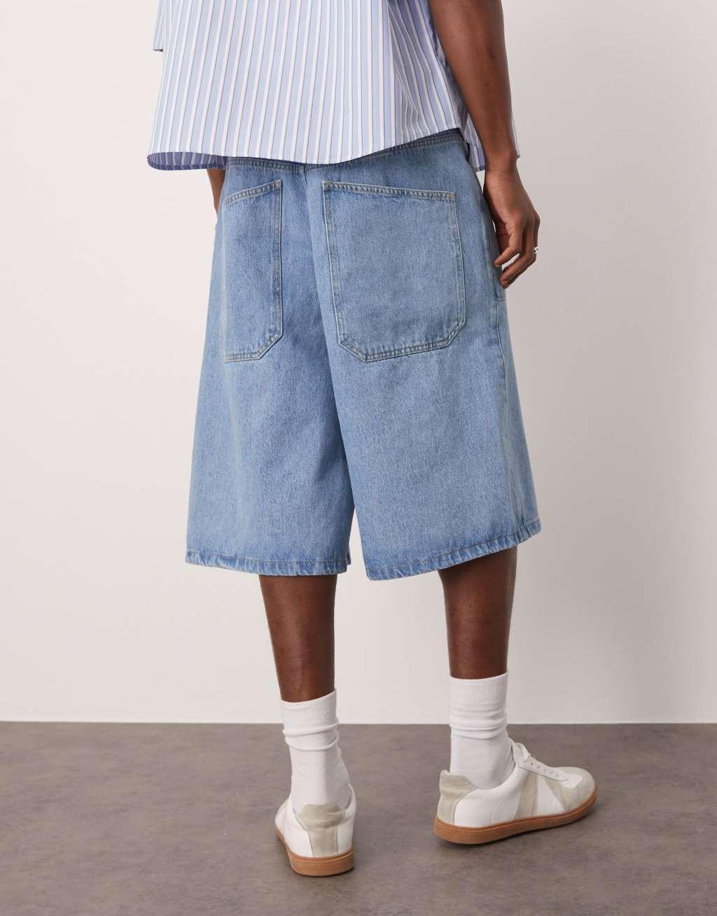 ASOS DESIGN denim jorts in mid wash Product Image