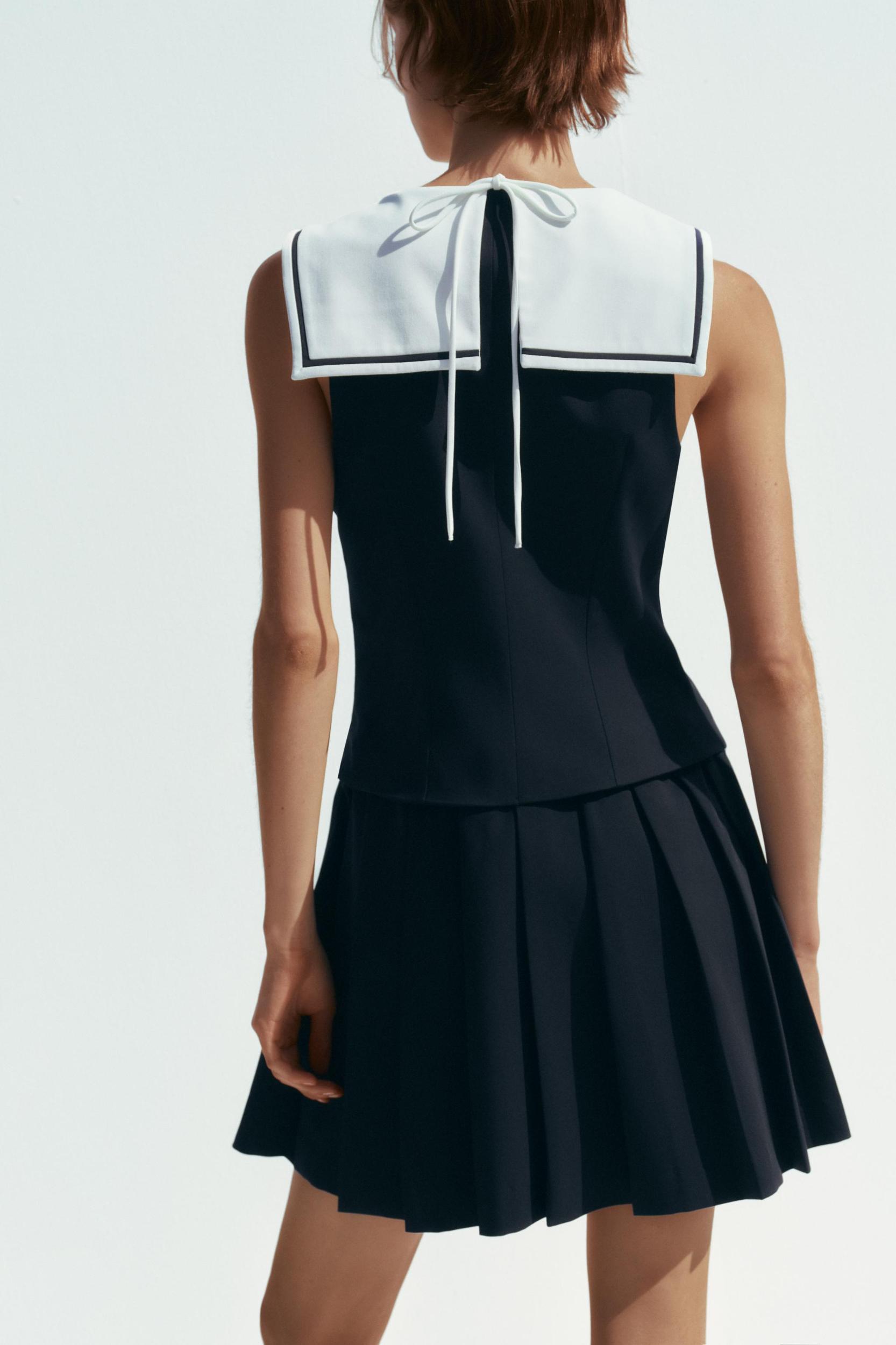 SHORT PLEATED DRESS Product Image