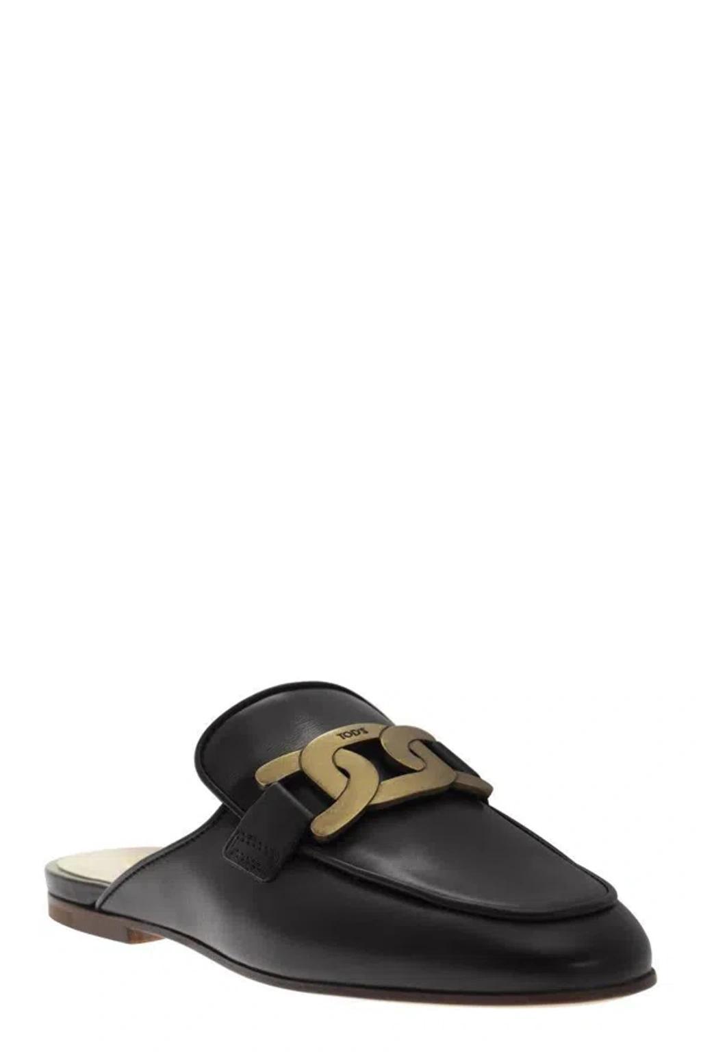 TOD'S Sabot Plaque Detail Mules In Black Product Image