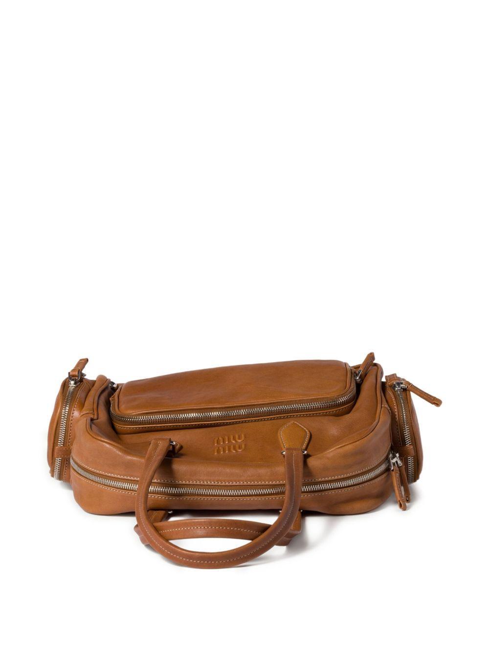 Pocket leather zipped tote bag Product Image
