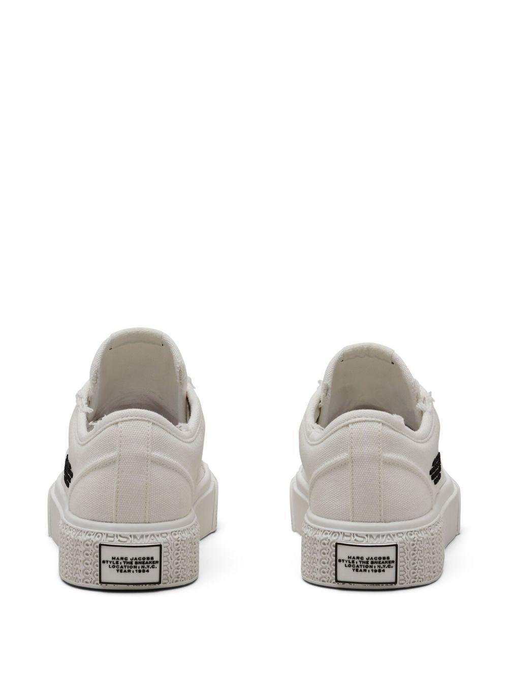 distressed canvas sneakers Product Image