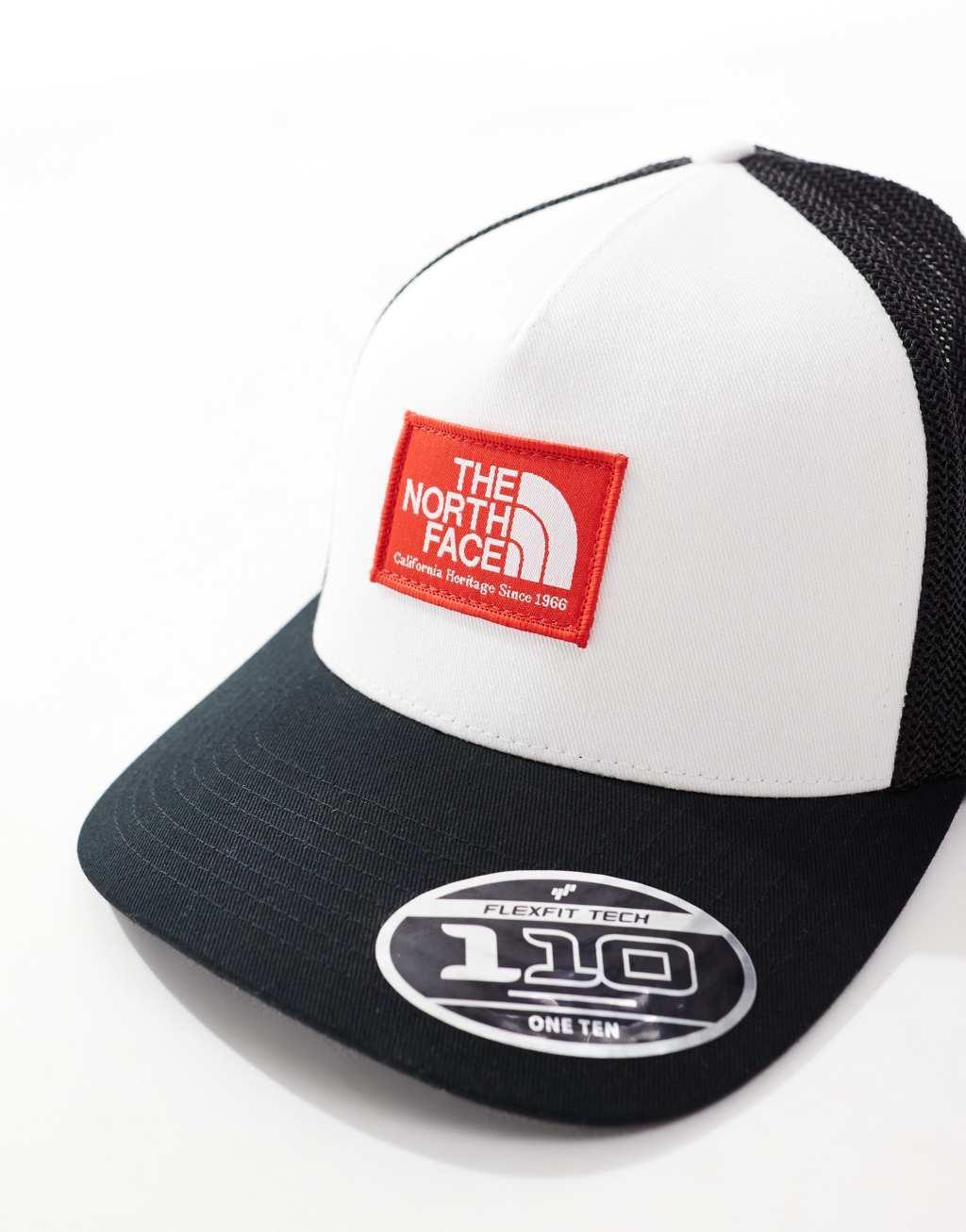 The North Face keep it patched trucker hat in black and white with red detail Product Image