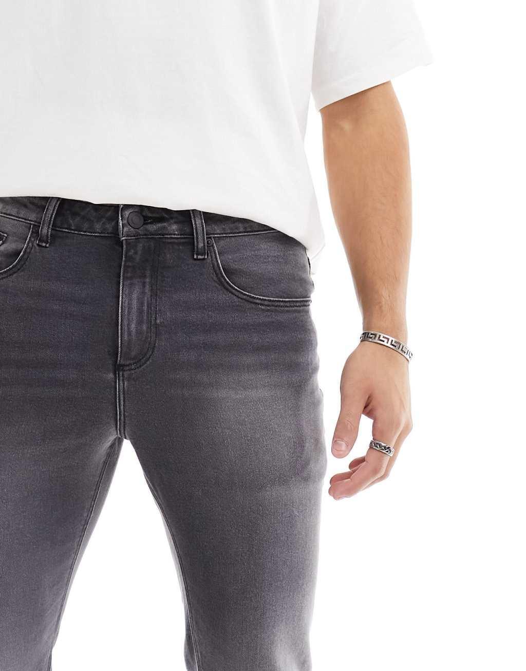 ASOS DESIGN stretch slim jeans in washed black Product Image