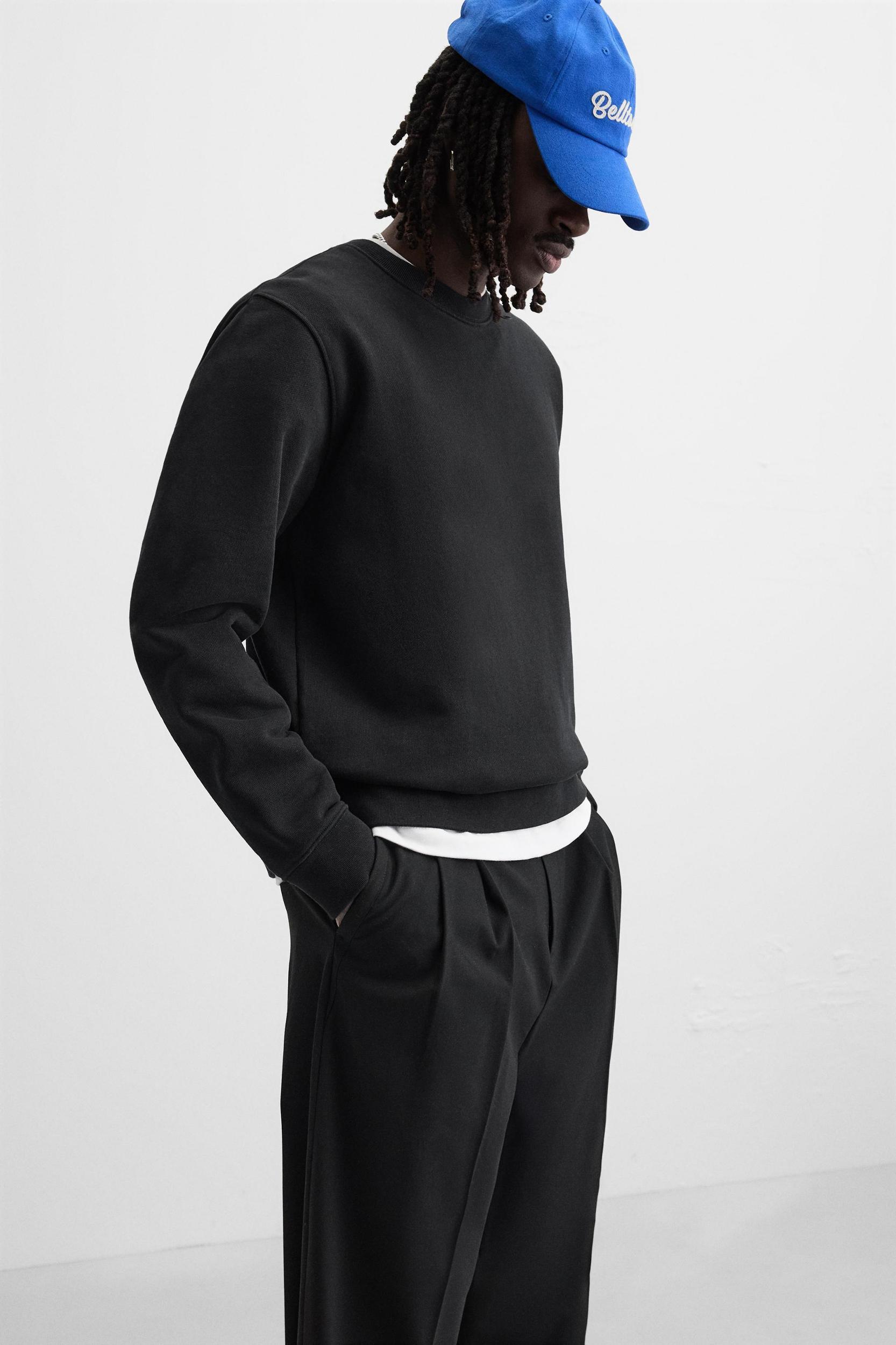 PLEATED WIDE FIT PANTS Product Image