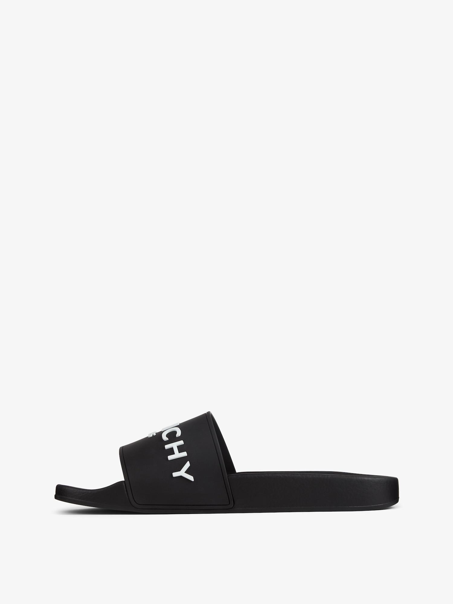Slide flat sandals in rubber Product Image