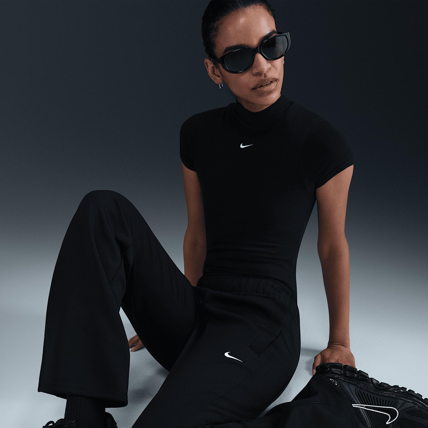 Women's Nike Sportswear Windrunner Mid-Rise Slim Knit Pants Product Image