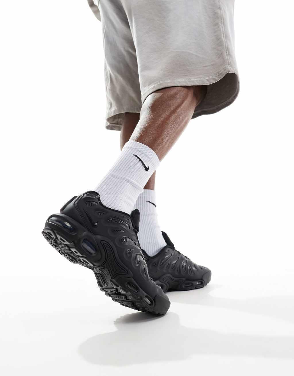 Nike Air Max Plus Drift sneakers in black Product Image
