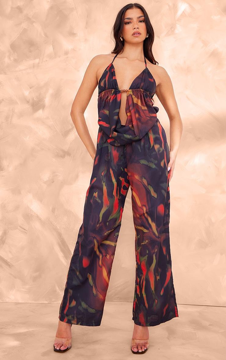 Black Leaf Printed Cowel Detail Halter Neck Jumpsuit Product Image