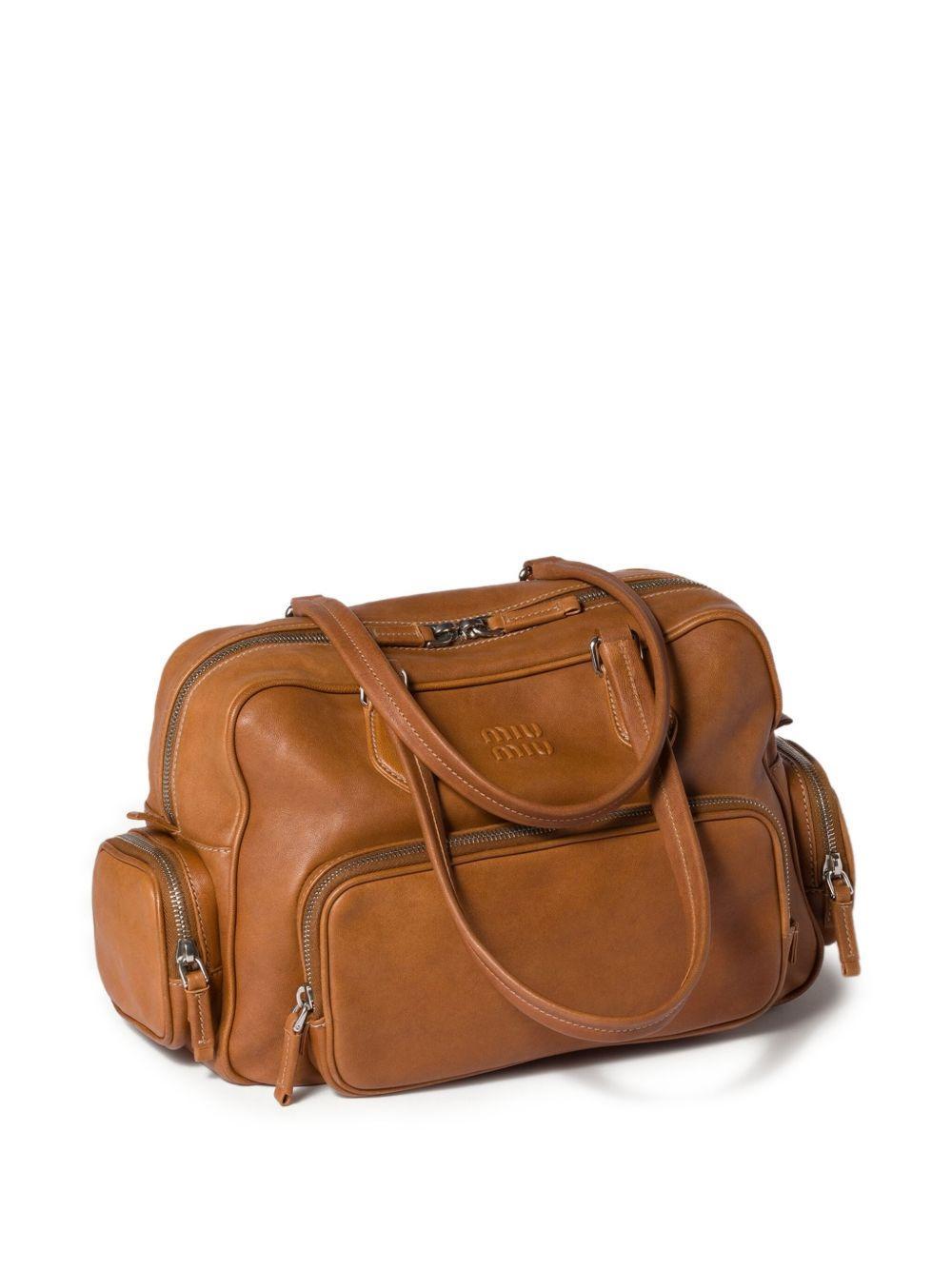 Pocket leather zipped tote bag Product Image