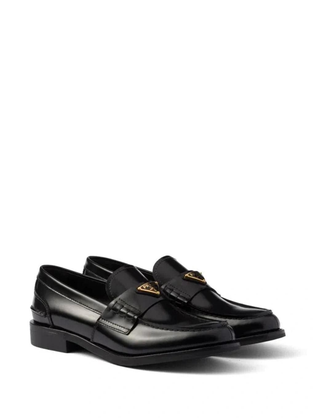 PRADA Triangle Logo Brushed Leather Loafers In Black Product Image