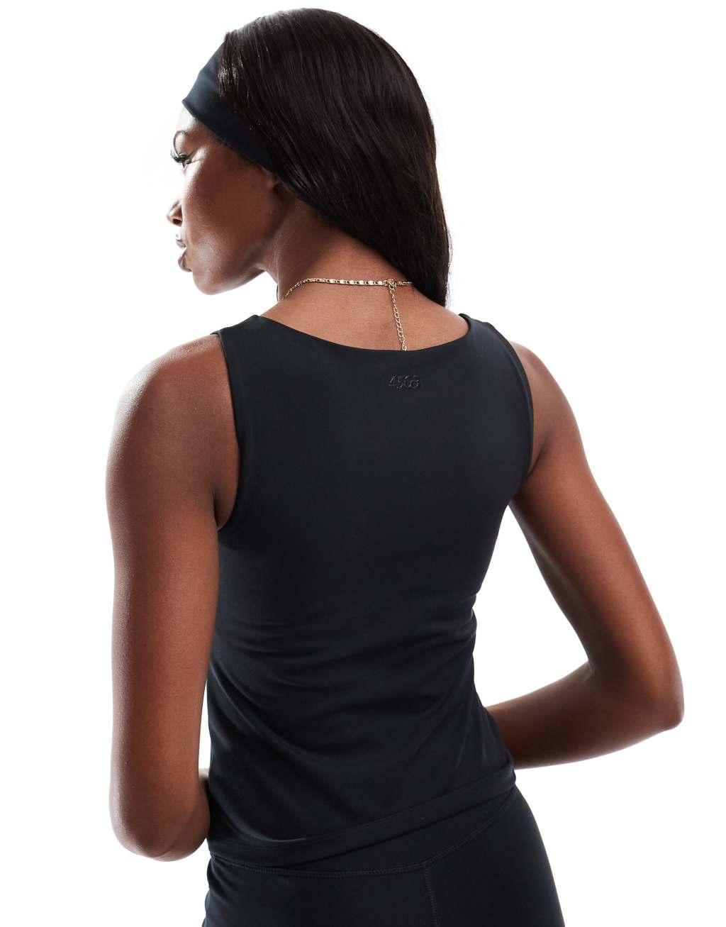 4505 Icon soft touch boat neck tank top with shelf bra in black  Product Image