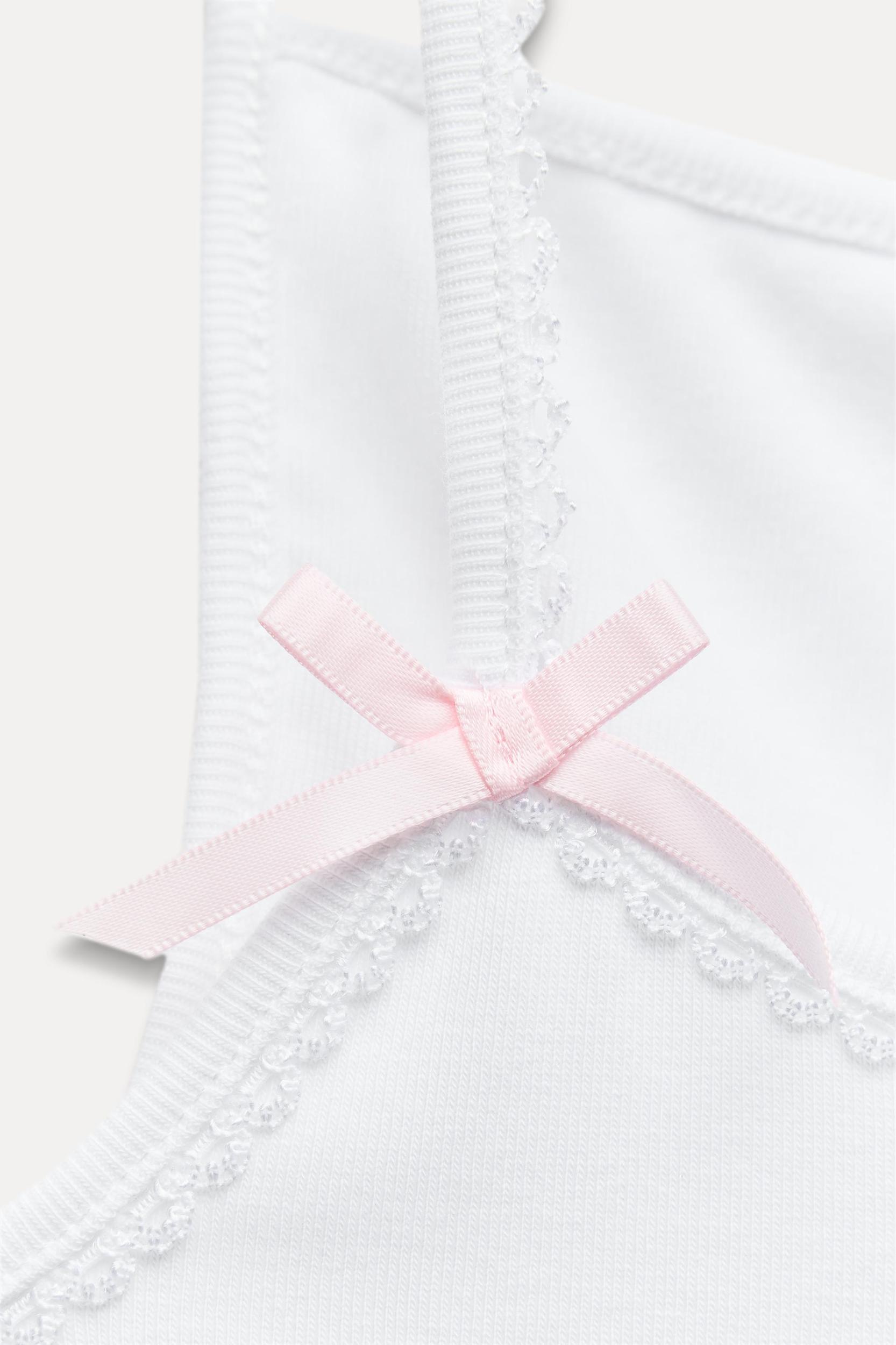 FLOWER TEXT BOW TOP Product Image