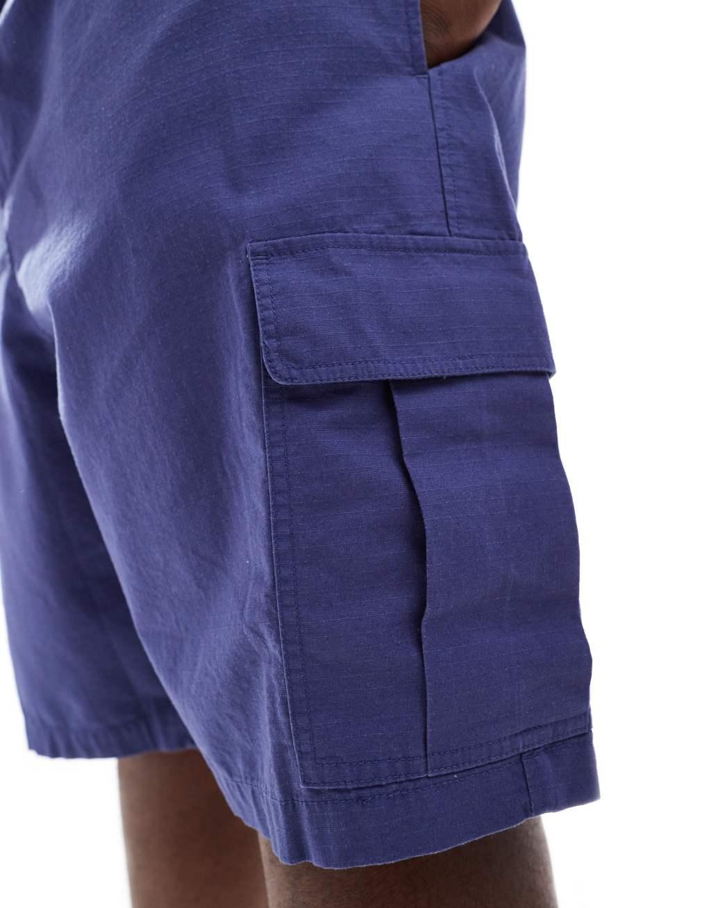 ASOS DESIGN cargo shorts in blue Product Image