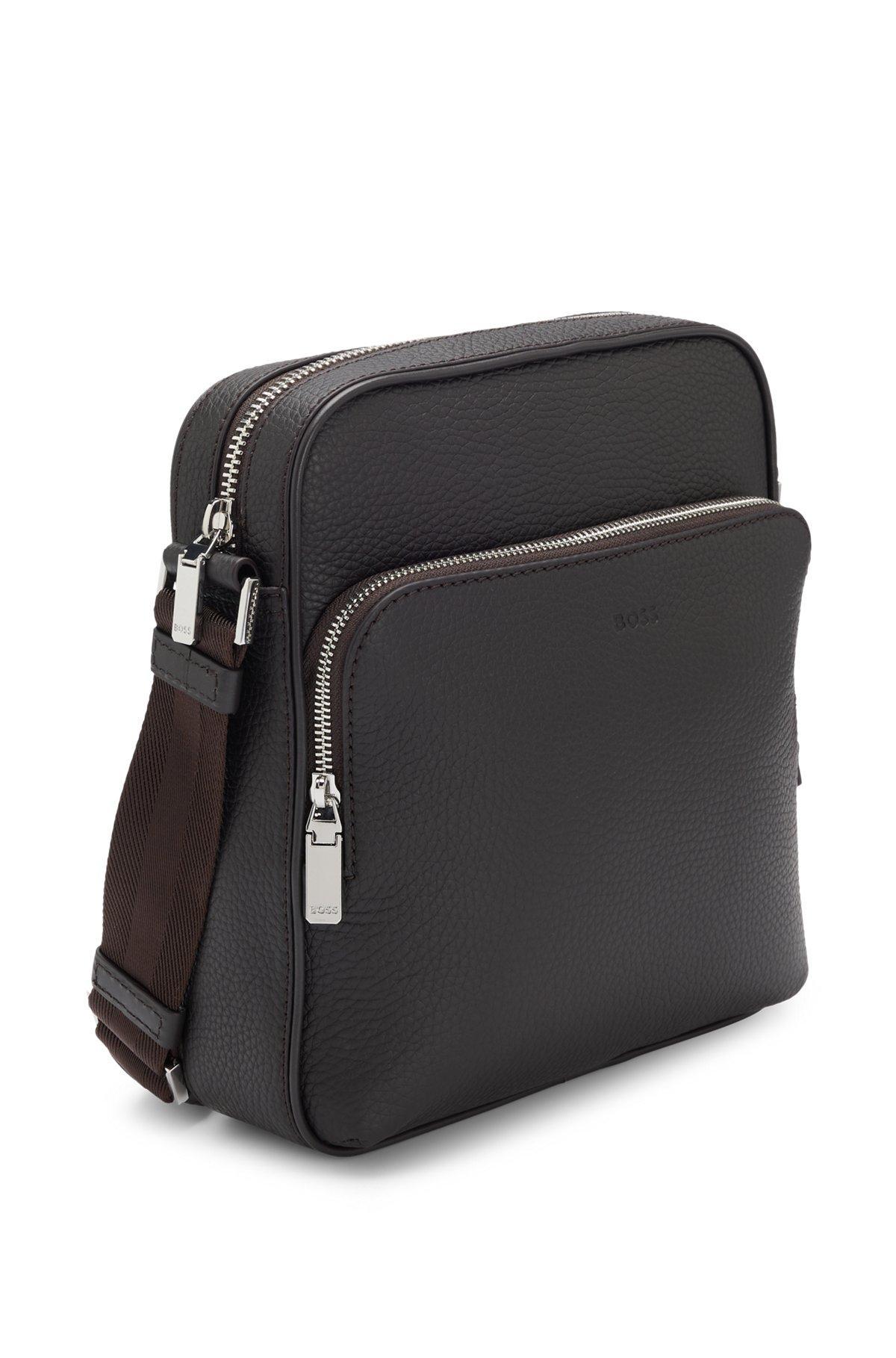Reporter bag in grained Italian leather with embossed logo Product Image