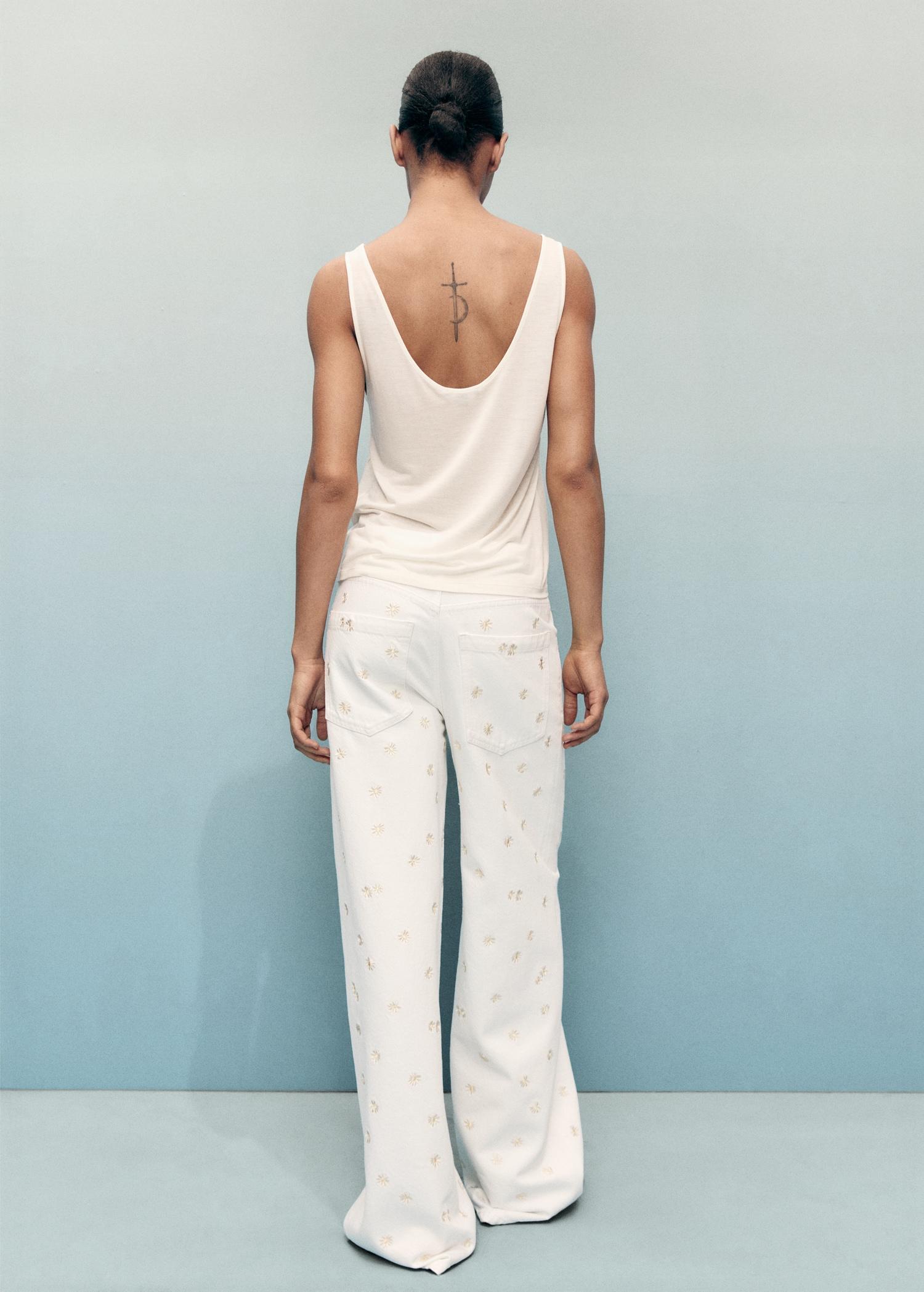 Flower-embroidered wideleg jeans - Women | MANGO USA Product Image