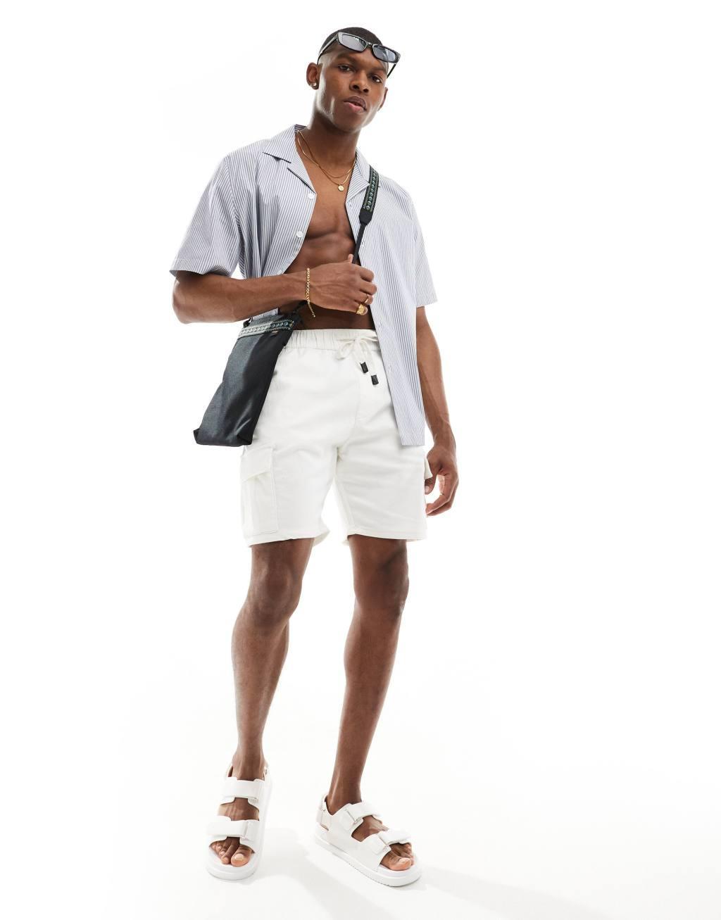Bershka cargo pocket shorts in white Product Image