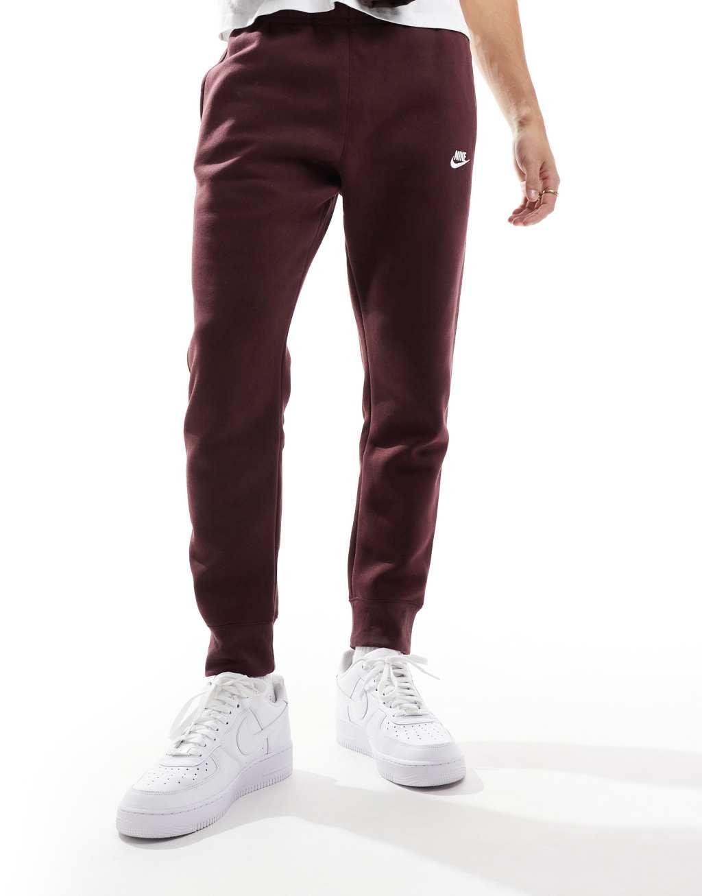 Nike Club cuffed joggers in burgundy Product Image