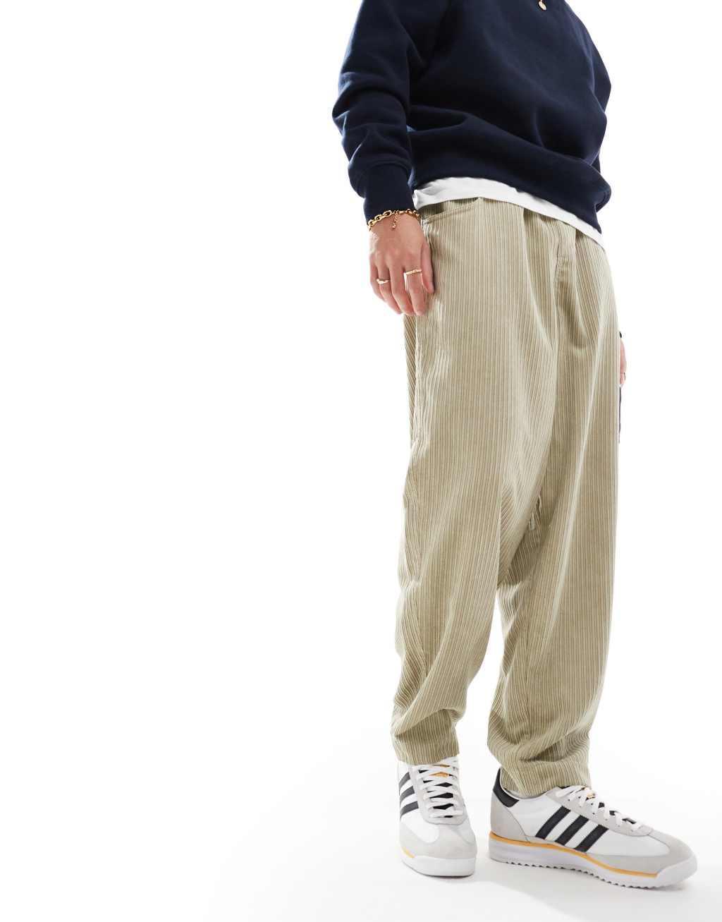 ASOS DESIGN tapered cord pants in beige  Product Image