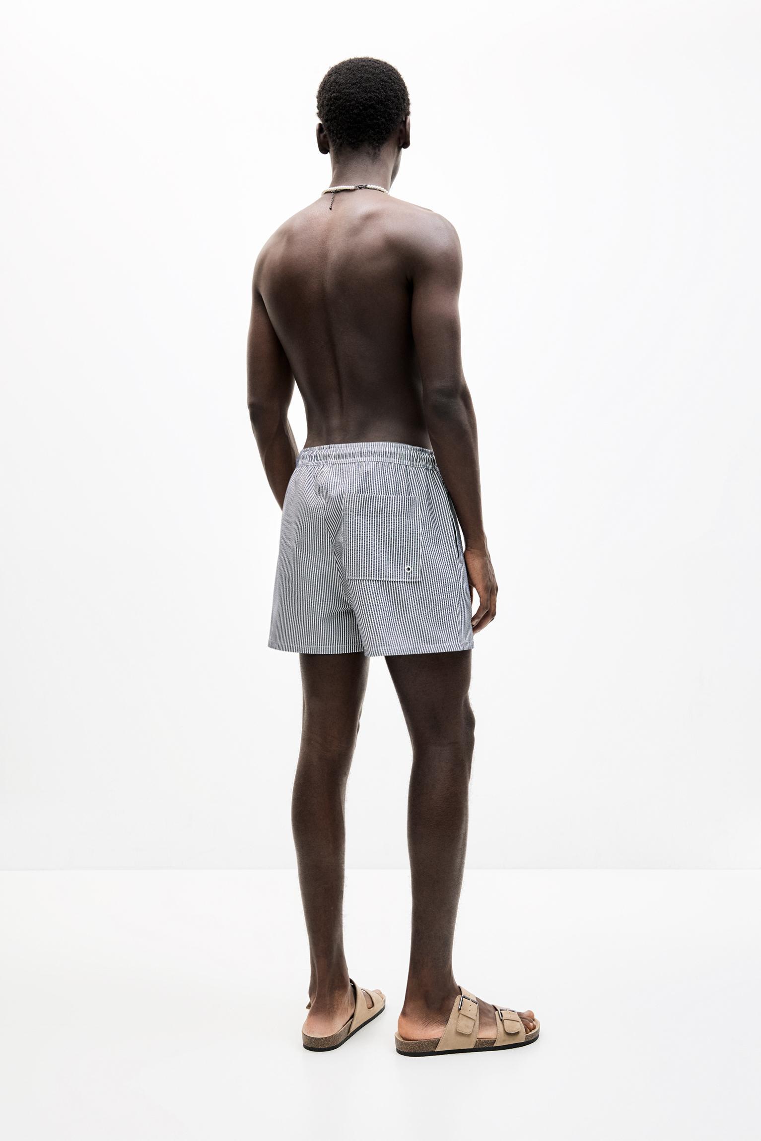 Striped seersucker swimming trunks Product Image