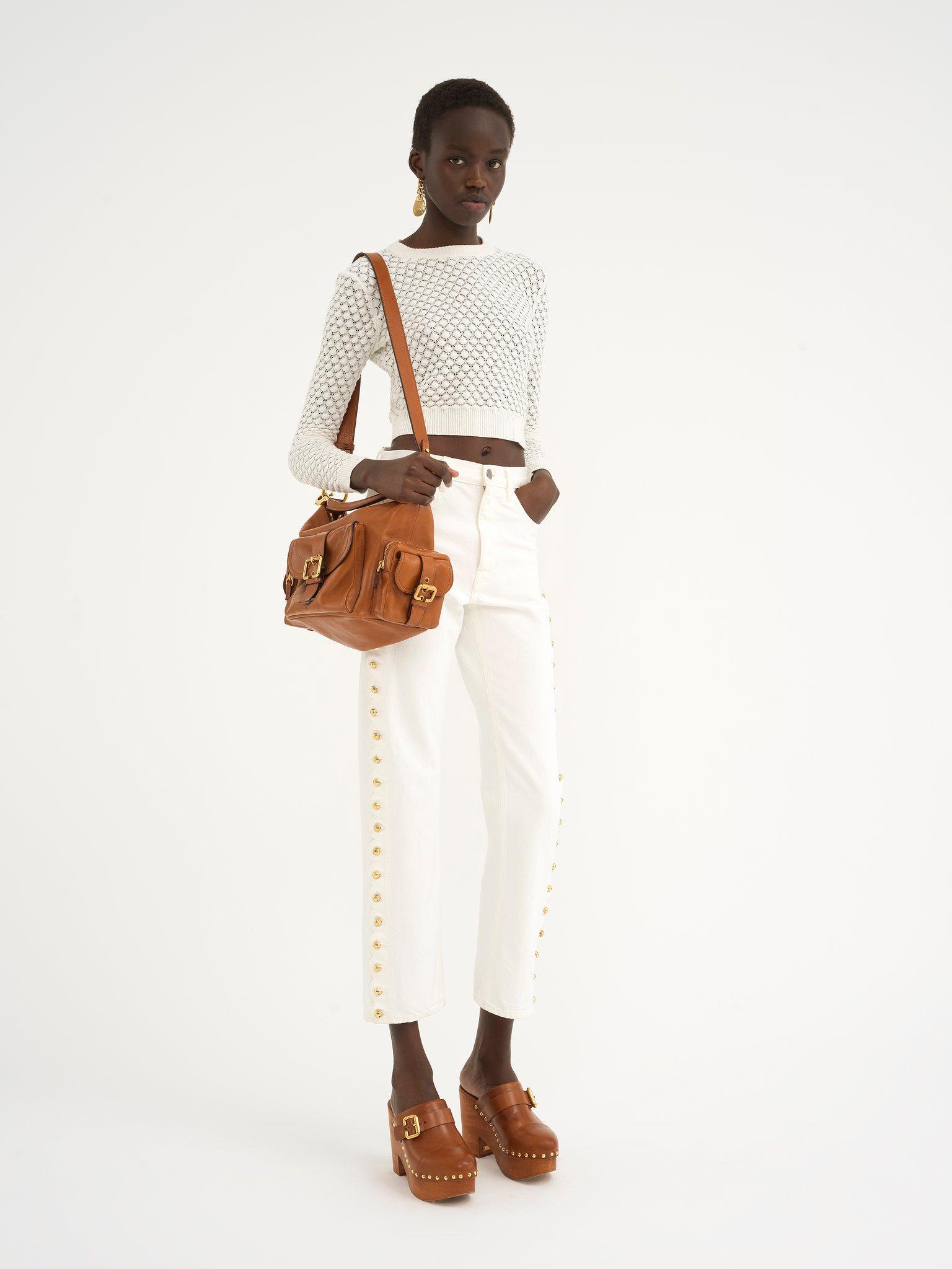 Cropped slim scallop jeans in denim Product Image