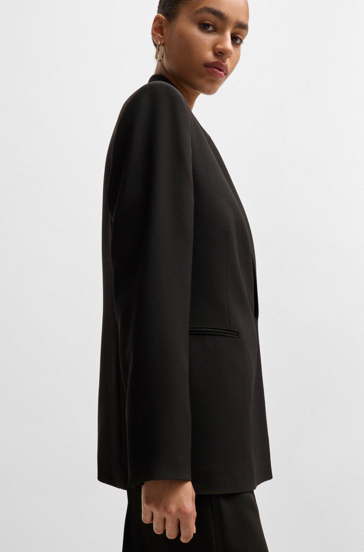 Relaxed-fit jacket with feature button Product Image