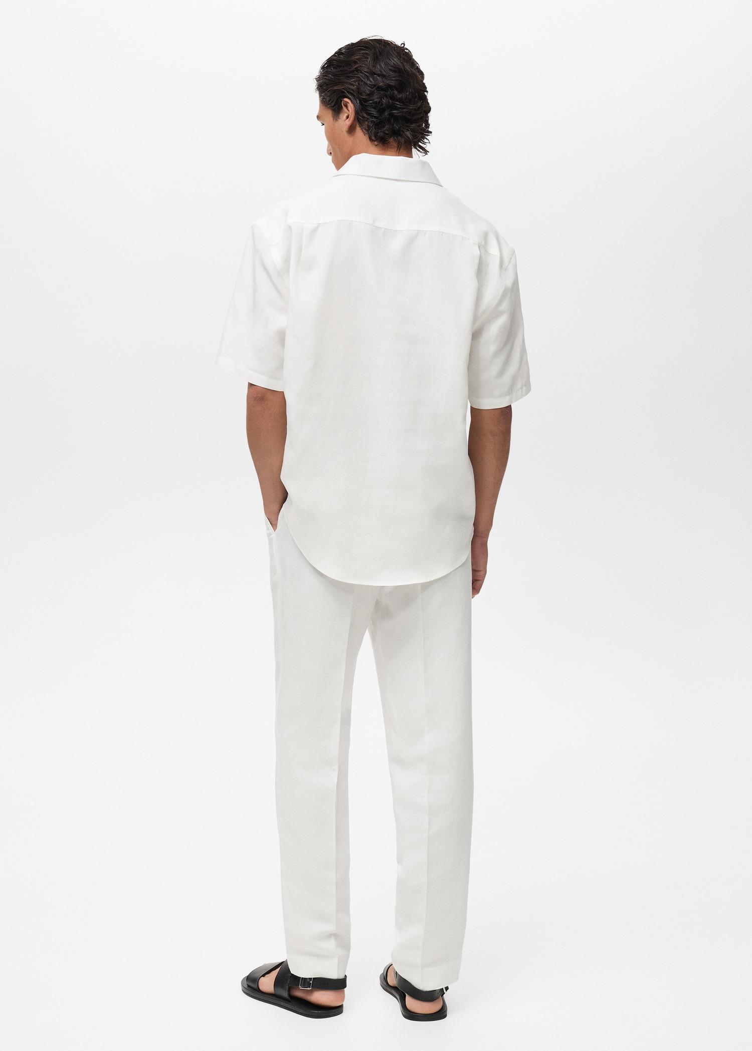 Lyocell linen regular-fit polo shirt - Men | MANGO USA Product Image