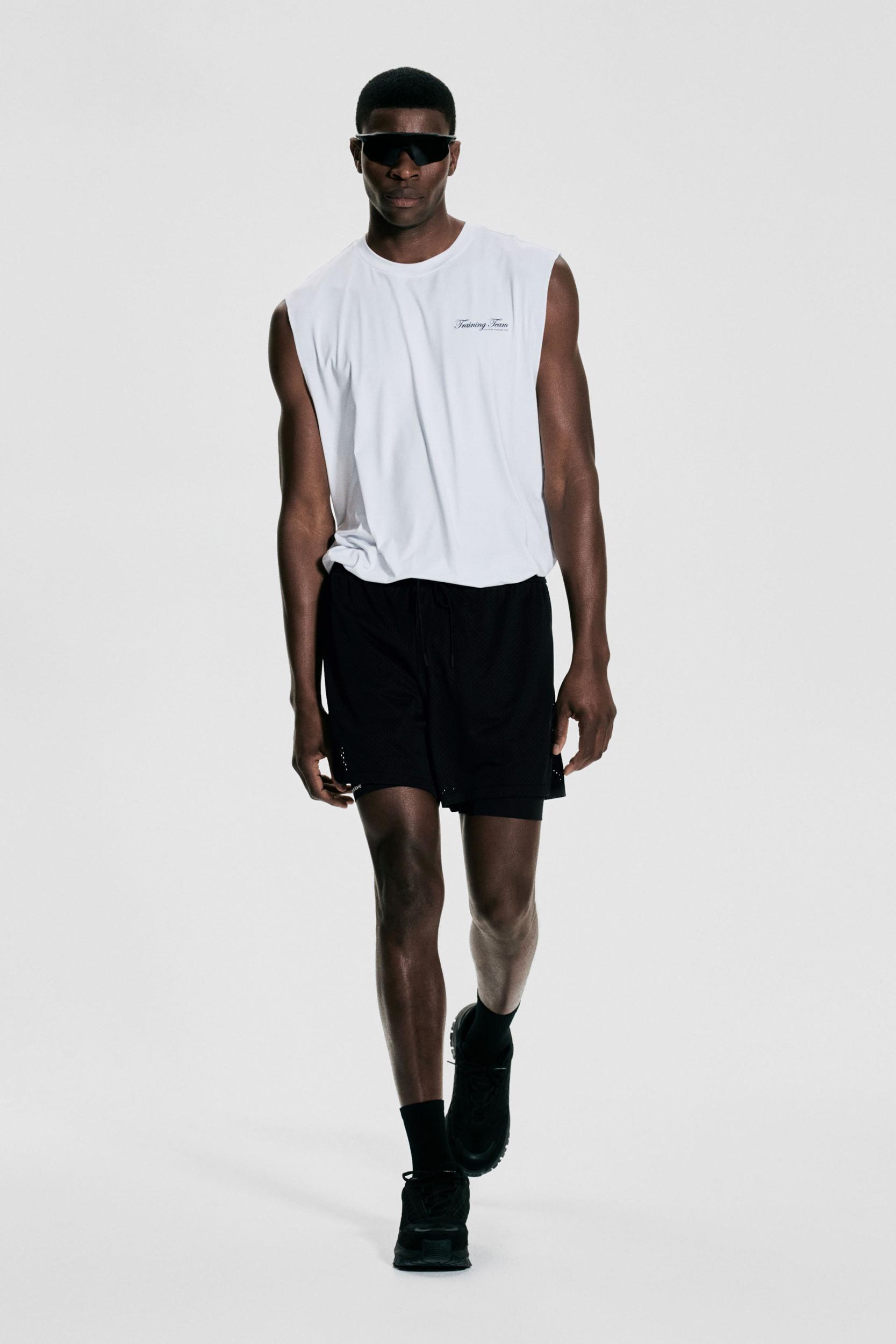 Mid-Length 2-in-1 Sports Shorts with DryMove™ Product Image
