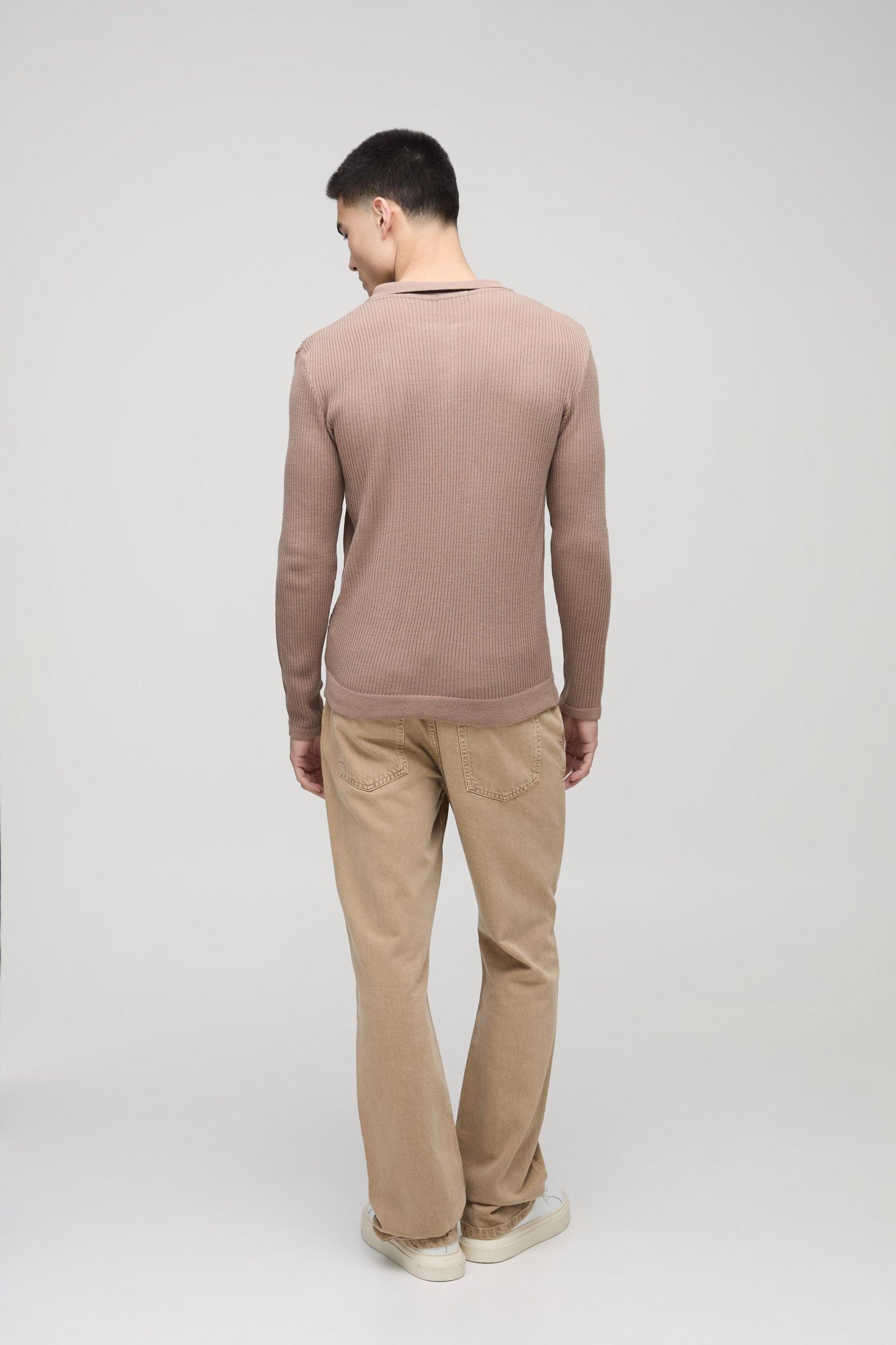 Muscle Fit Ribbed Button Neck Knitted Polo | boohooMAN USA Product Image