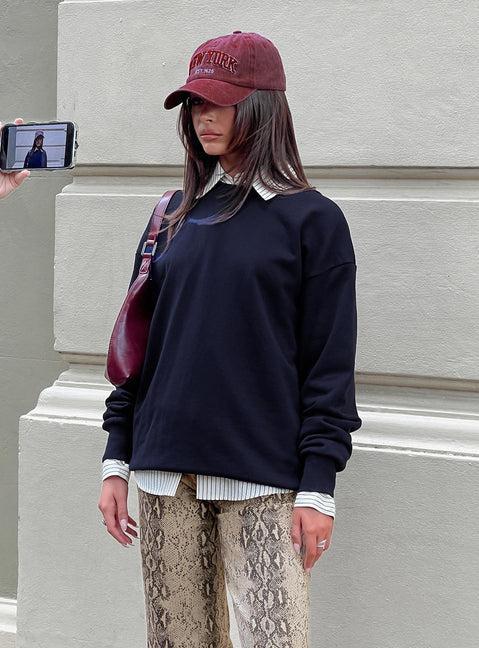 Merino Roll-Neck Jumper in Black Product Image