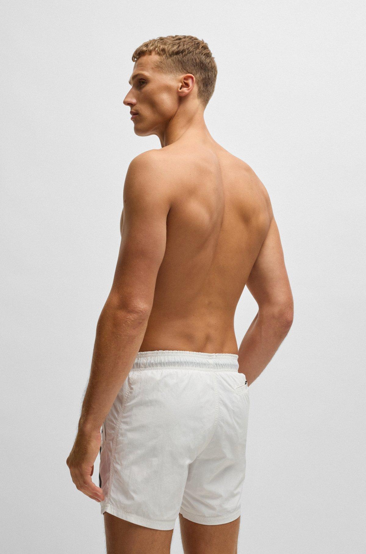 Fully lined swim shorts with logo print Product Image