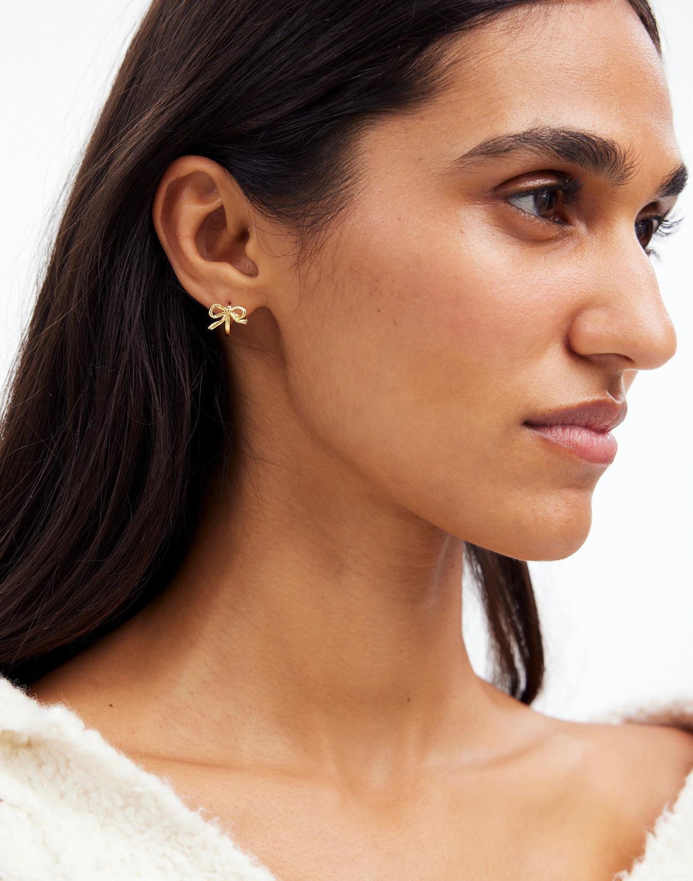 Metal Bow Huggie Hoop Earrings Product Image