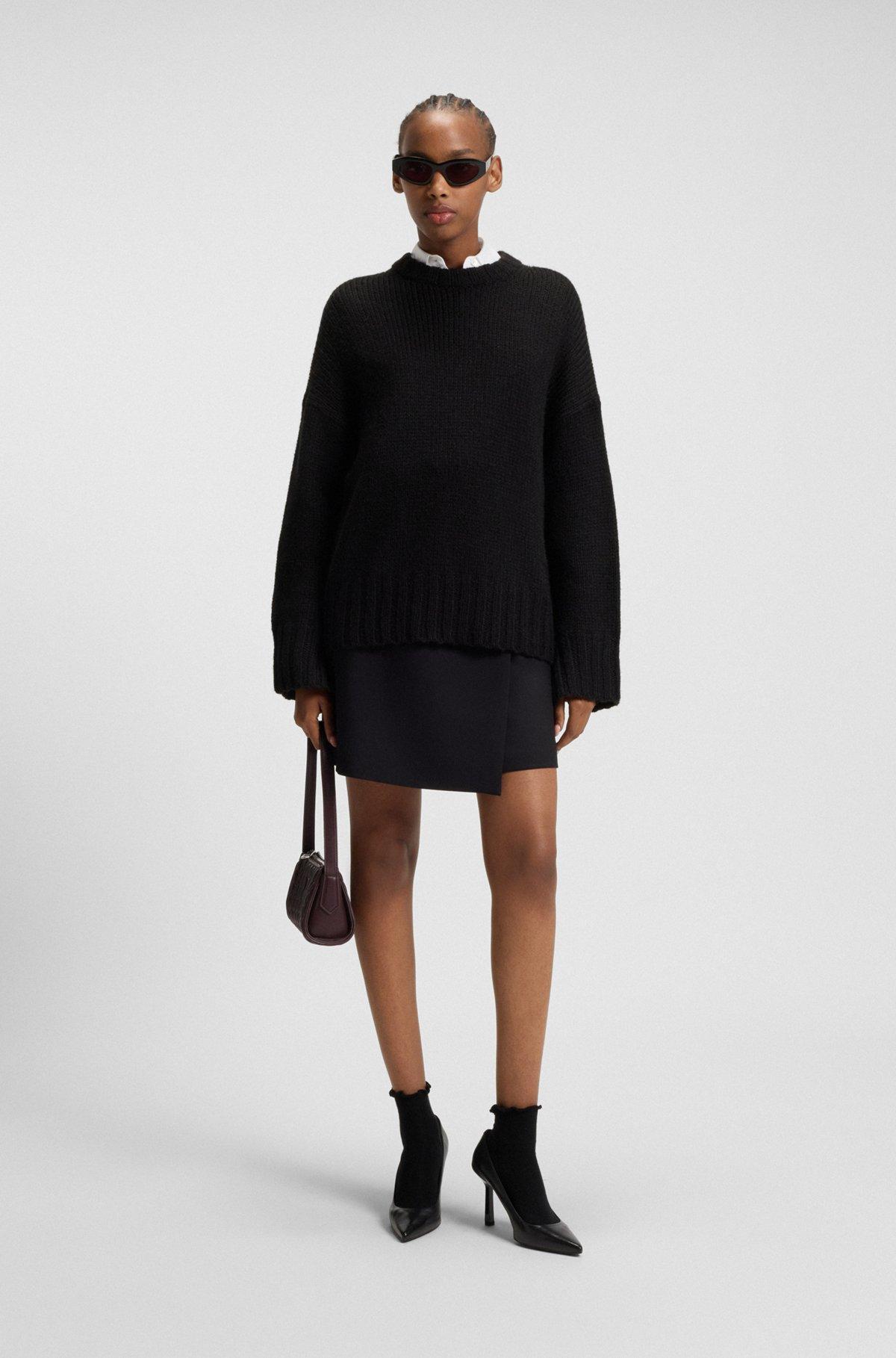 Oversize-fit knitted sweater with embroidered logo Product Image
