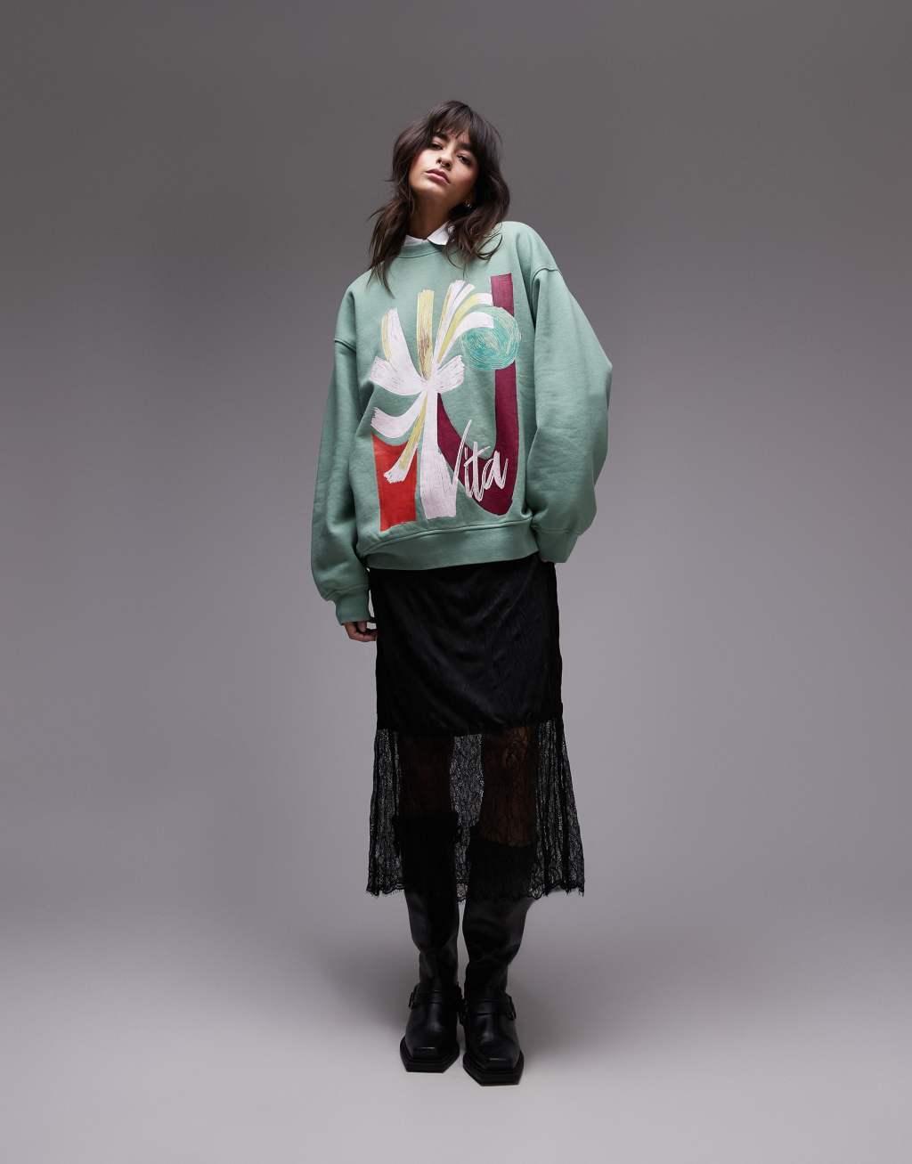 Topshop oversized washed sweatshirt with abstract graphic in green Product Image
