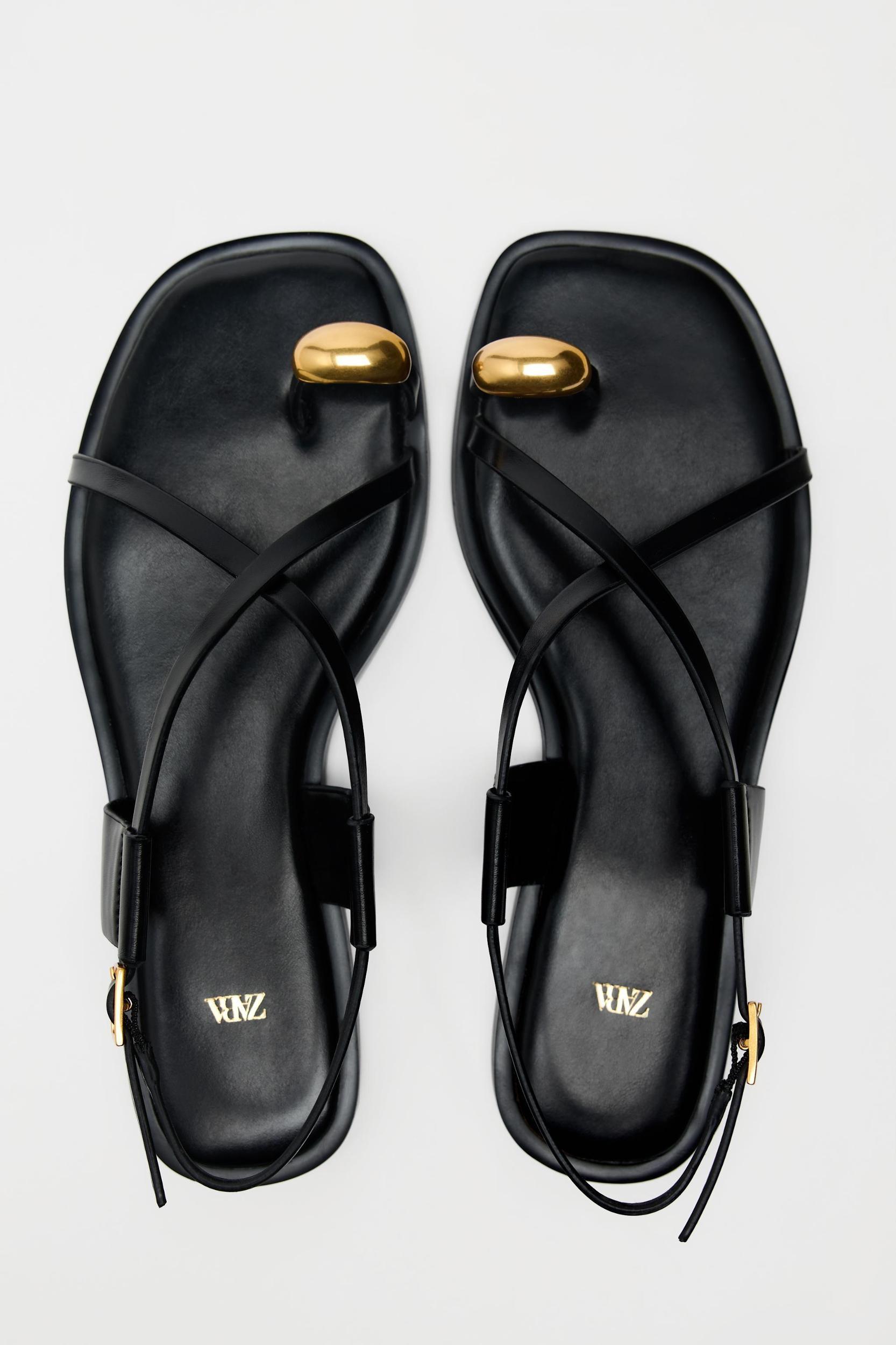 FLAT STRAPPY SANDALS WITH METAL ORNAMENT Product Image