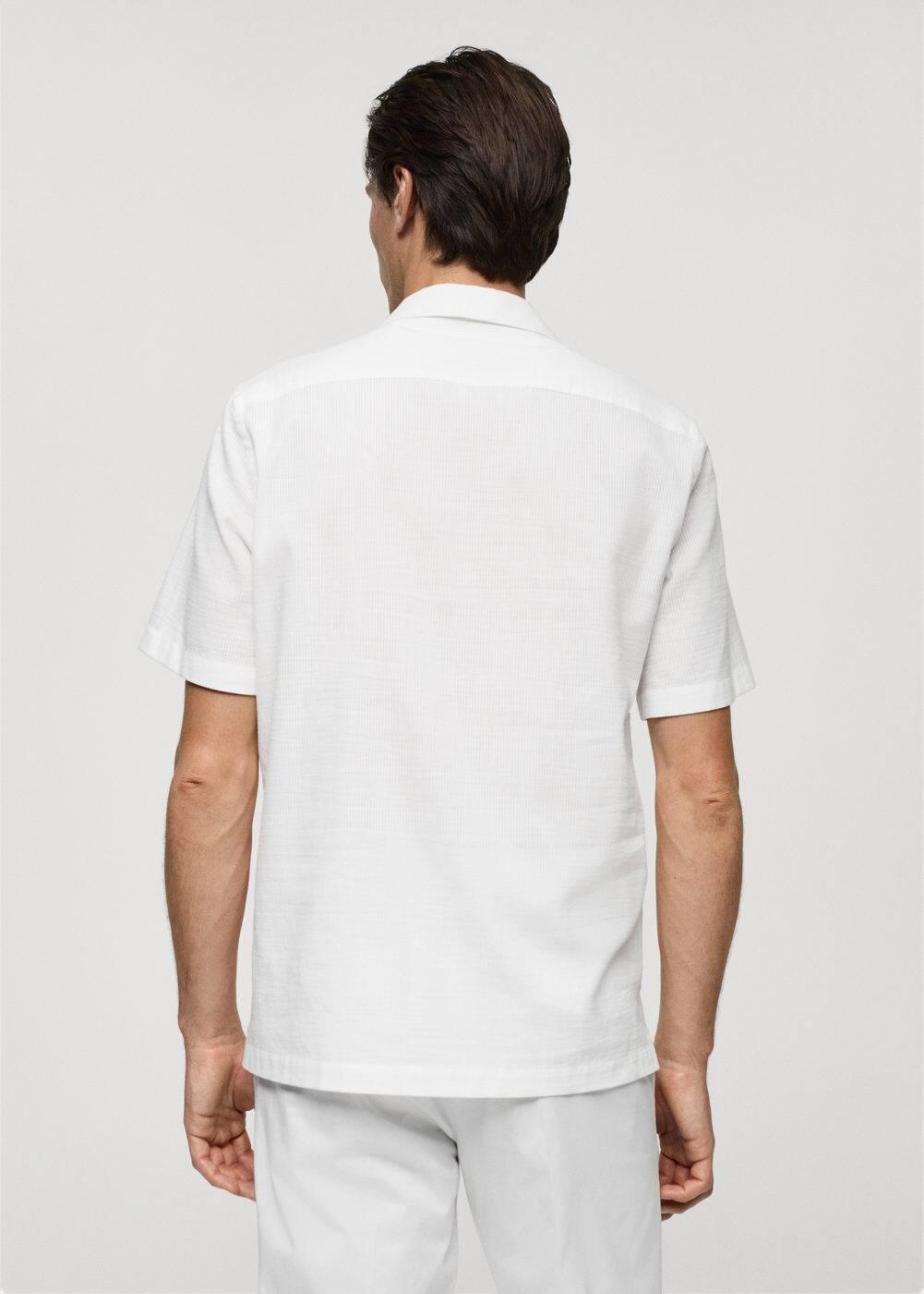 Regular-fit 100% seersucker cotton shirt - Men | MANGO USA Product Image