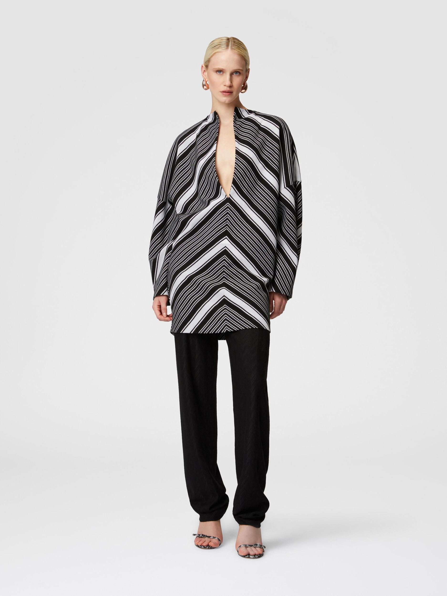 Mini-dress with oversized sleeves and plunging V-neckline Product Image