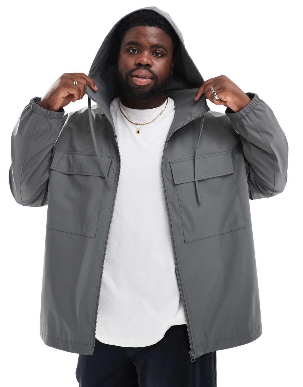 ASOS DESIGN rubberized rain jacket with chest pockets in charcoal Product Image