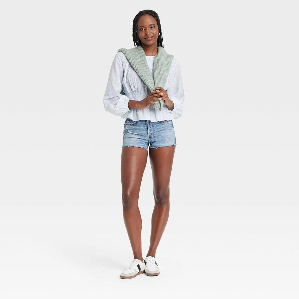 Women's High-Rise Cutoff Mini Jean Shorts - Universal Thread™ Light Wash 4: Heavyweight , Fly Button Closure Product Image