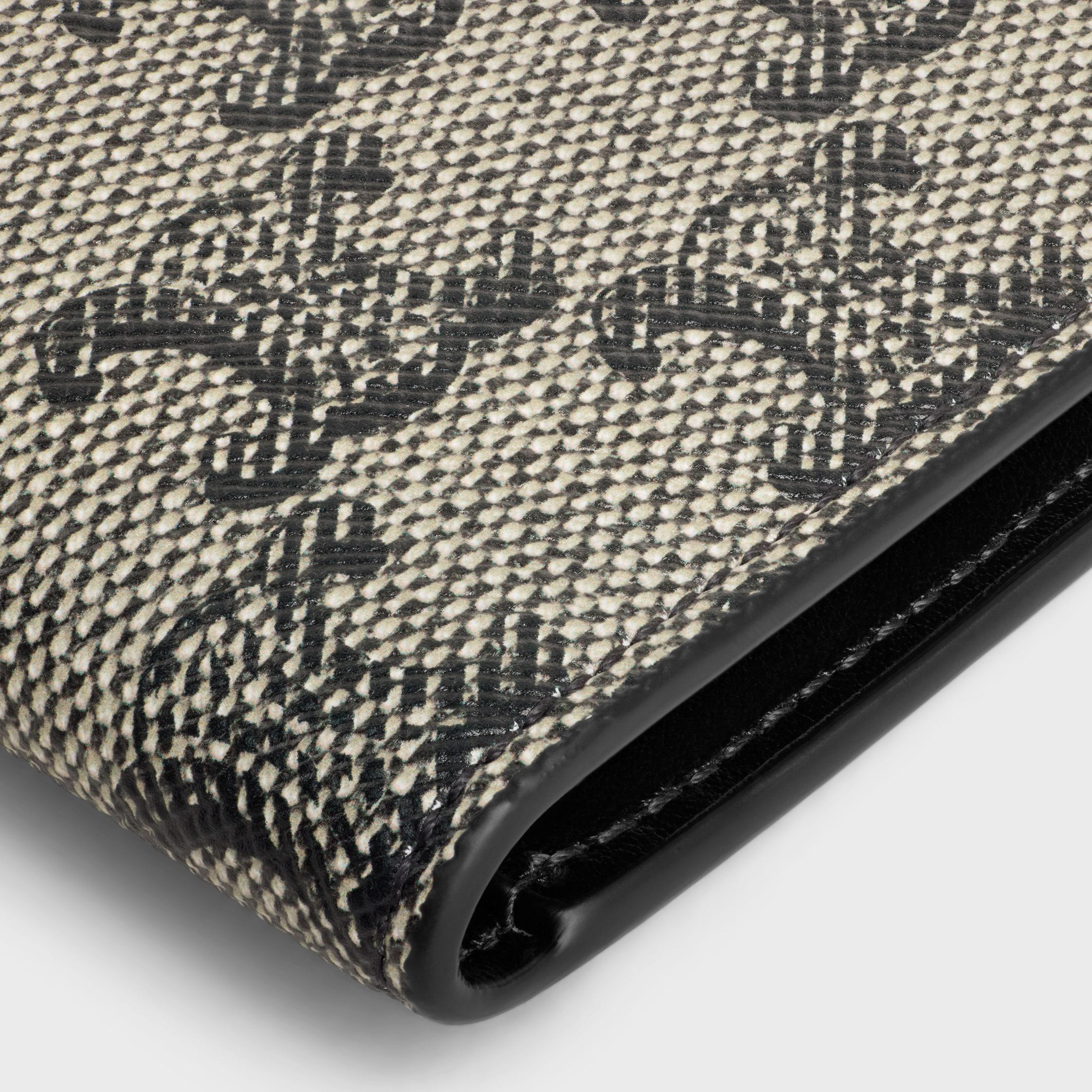 VERTICAL CARD HOLDER IN TRIOMPHE CANVAS AND CALFSKIN Product Image